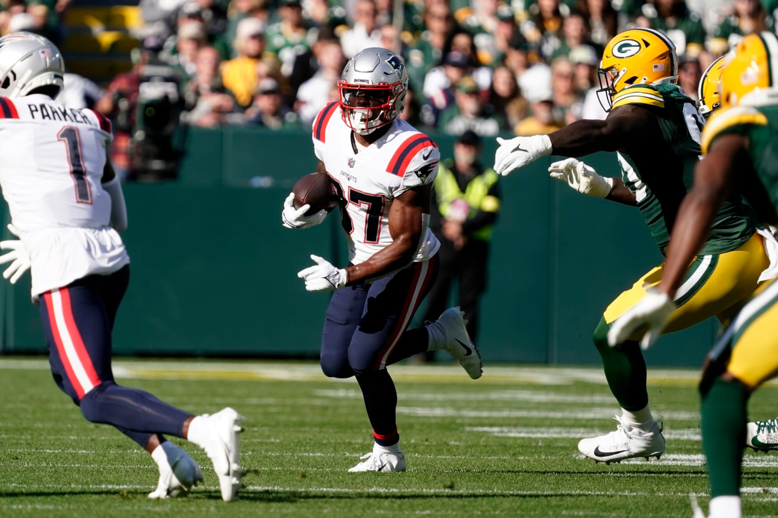 New England Patriots running back Damien Harris (37) carries the ball up field during the first half of an NFL football game against the Green Bay Packers, Sunday, Oct. 2, 2022, in Green Bay, Wis. (AP Photo/Morry Gash) New England Patriots running back Damien Harris (37) carries the ball up field during the first half of an NFL football game against the Green Bay Packers, Sunday, Oct. 2, 2022, in Green Bay, Wis. (AP Photo/Morry Gash)