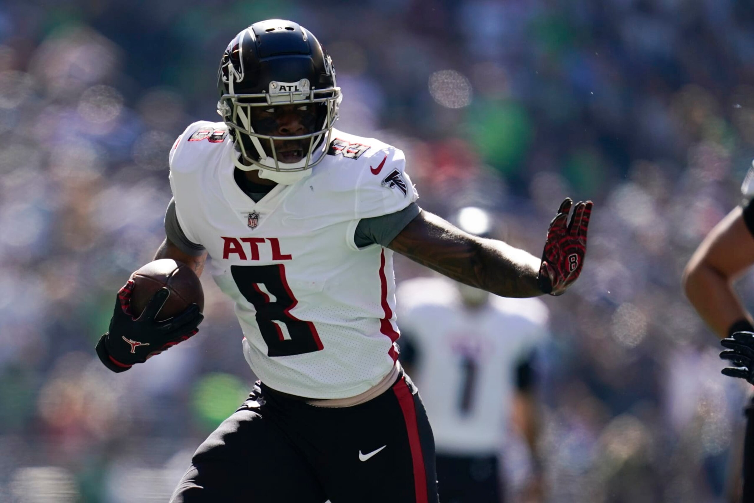 Atlanta Falcons tight end Kyle Pitts gets away from Seattle Seahawks linebacker Jordyn Brooks during the first half of an NFL football game Sunday, Sept. 25, 2022, in Seattle. (AP Photo/Ashley Landis) Atlanta Falcons tight end Kyle Pitts gets away from Seattle Seahawks linebacker Jordyn Brooks during the first half of an NFL football game Sunday, Sept. 25, 2022, in Seattle. (AP Photo/Ashley Landis)