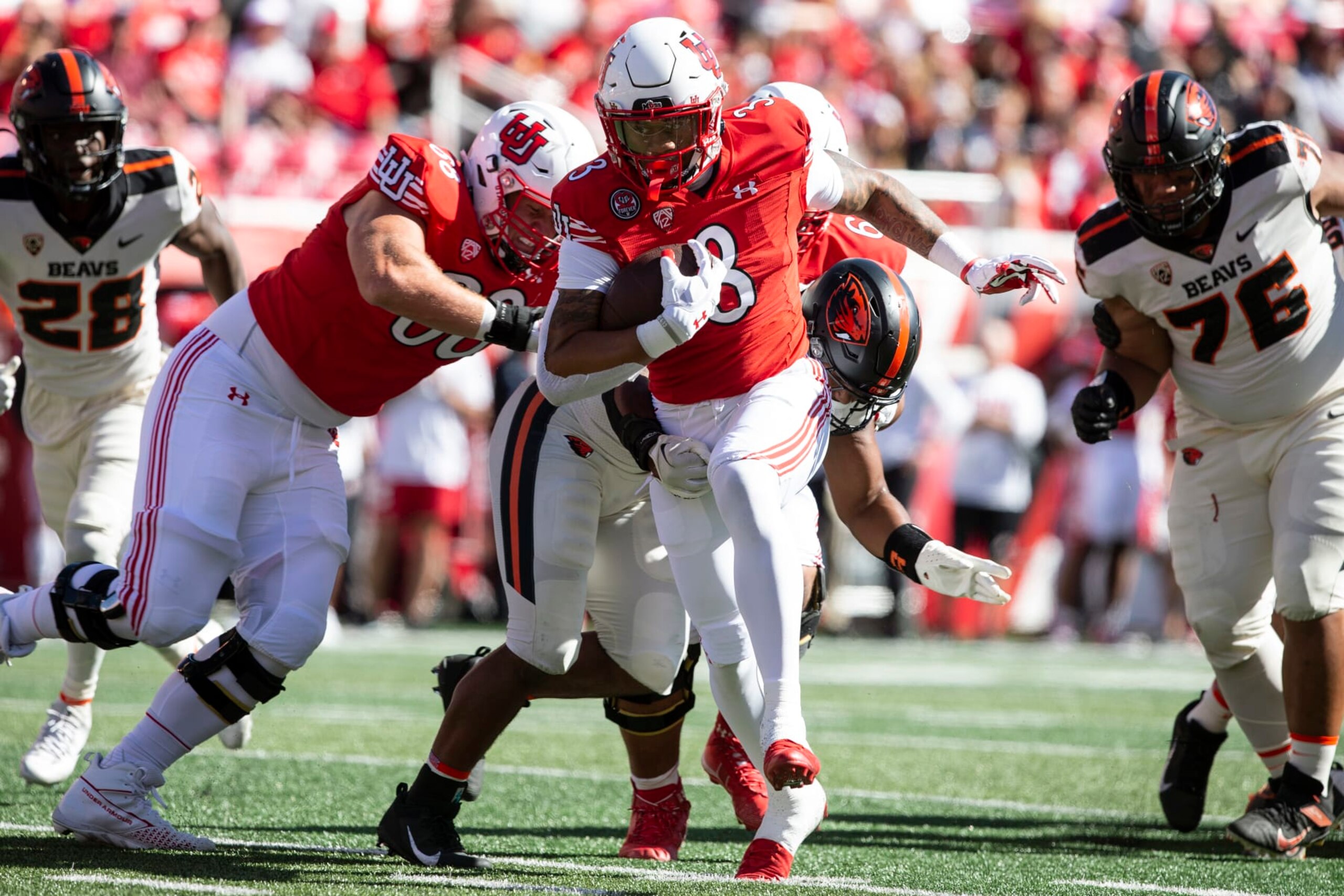SALT LAKE CITY, UT- OCTOBER 1: JaQuinden Jackson #3 of the Utah Utes rushes the ball against the Oregon State Beavers during the second half of their game October 1, 2022 at Rice-Eccles Stadium in Salt Lake City, Utah. (Photo by Chris Gardner/ Getty Images)
