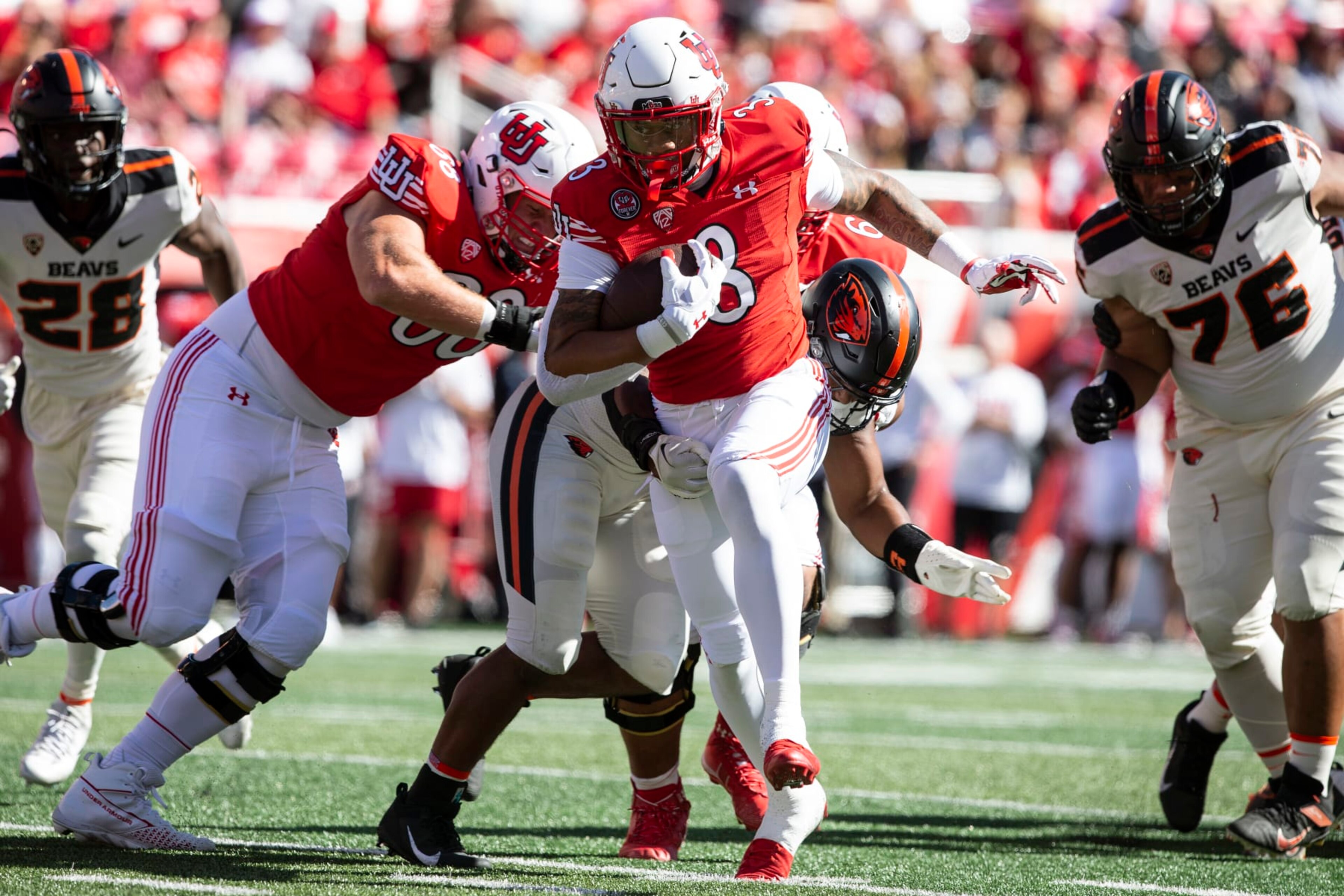 SALT LAKE CITY, UT- OCTOBER 1: JaQuinden Jackson #3 of the Utah Utes rushes the ball against the Oregon State Beavers during the second half of their game October 1, 2022 at Rice-Eccles Stadium in Salt Lake City, Utah. (Photo by Chris Gardner/ Getty Images)