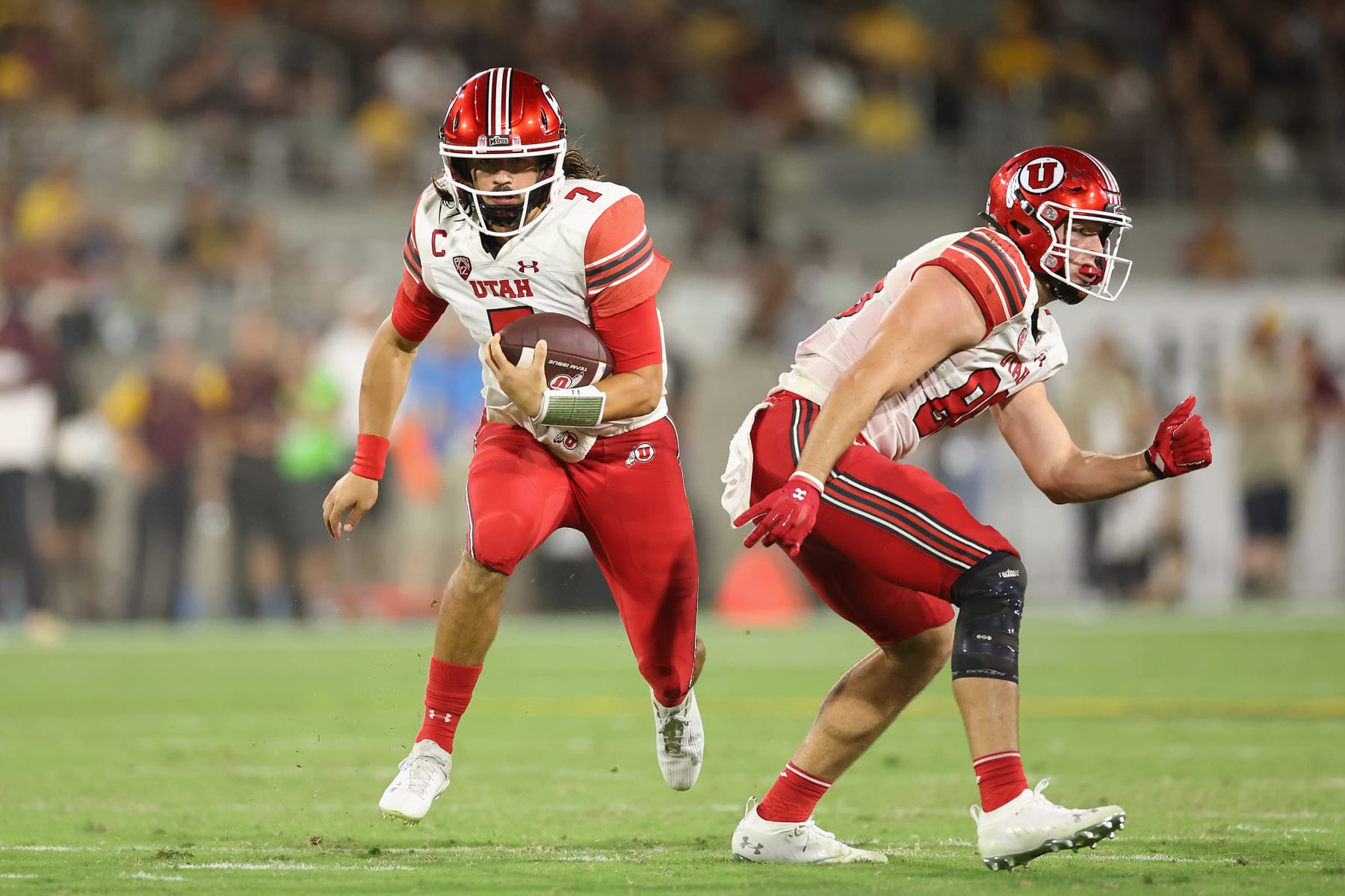 TEMPE, ARIZONA - SEPTEMBER 24: Quarterback Cameron Rising #7 of the Utah Utes rushes the football against the Arizona State Sun Devils during the second half of the NCAAF game at Sun Devil Stadium on September 24, 2022 in Tempe, Arizona. (Photo by Christian Petersen/Getty Images)