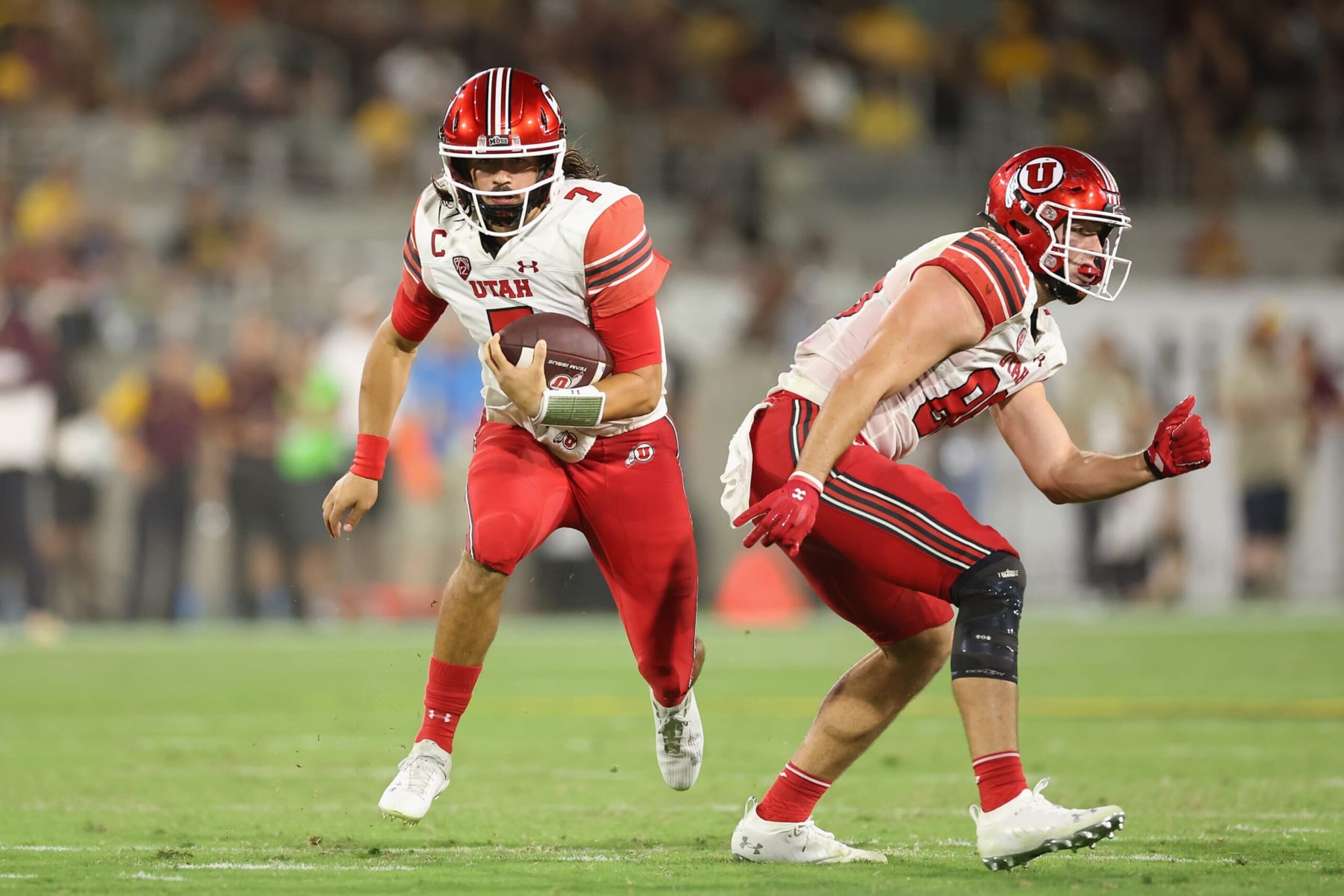 TEMPE, ARIZONA - SEPTEMBER 24: Quarterback Cameron Rising #7 of the Utah Utes rushes the football against the Arizona State Sun Devils during the second half of the NCAAF game at Sun Devil Stadium on September 24, 2022 in Tempe, Arizona. (Photo by Christian Petersen/Getty Images)