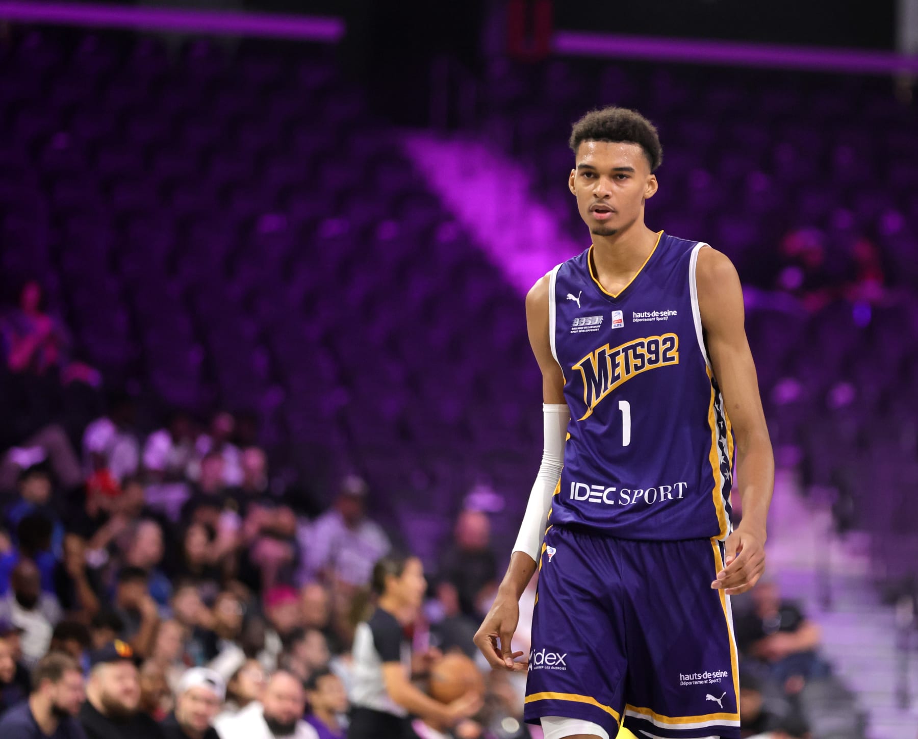 HENDERSON, NEVADA - OCTOBER 04: Victor Wembanyama #1 of Boulogne-Levallois Metropolitans 92 walks on the court during the first quarter of an exhibition game against G League Ignite at The Dollar Loan Center on October 04, 2022 in Henderson, Nevada. Ignite defeated Metropolitans 92 122-115. NOTE TO USER: User expressly acknowledges and agrees that, by downloading and or using this photograph, User is consenting to the terms and conditions of the Getty Images License Agreement. (Photo by Ethan Miller/Getty Images)