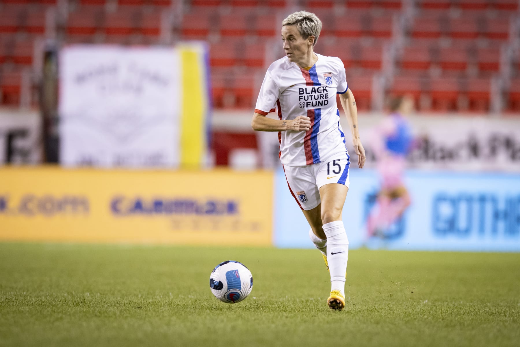 HARRISON, NJ - SEPTEMBER 21: Megan Rapinoe #15 of OL Reign takes he ball down the pitch in the second half of the National Womens Soccer League match against NJ/NY Gotham FC at Red Bull Arena on September 21, 2022 in Harrison, New Jersey. (Photo by Ira L. Black - Corbis/Getty Images) HARRISON, NJ - SEPTEMBER 21: Megan Rapinoe #15 of OL Reign takes he ball down the pitch in the second half of the National Womens Soccer League match against NJ/NY Gotham FC at Red Bull Arena on September 21, 2022 in Harrison, New Jersey. (Photo by Ira L. Black - Corbis/Getty Images)
