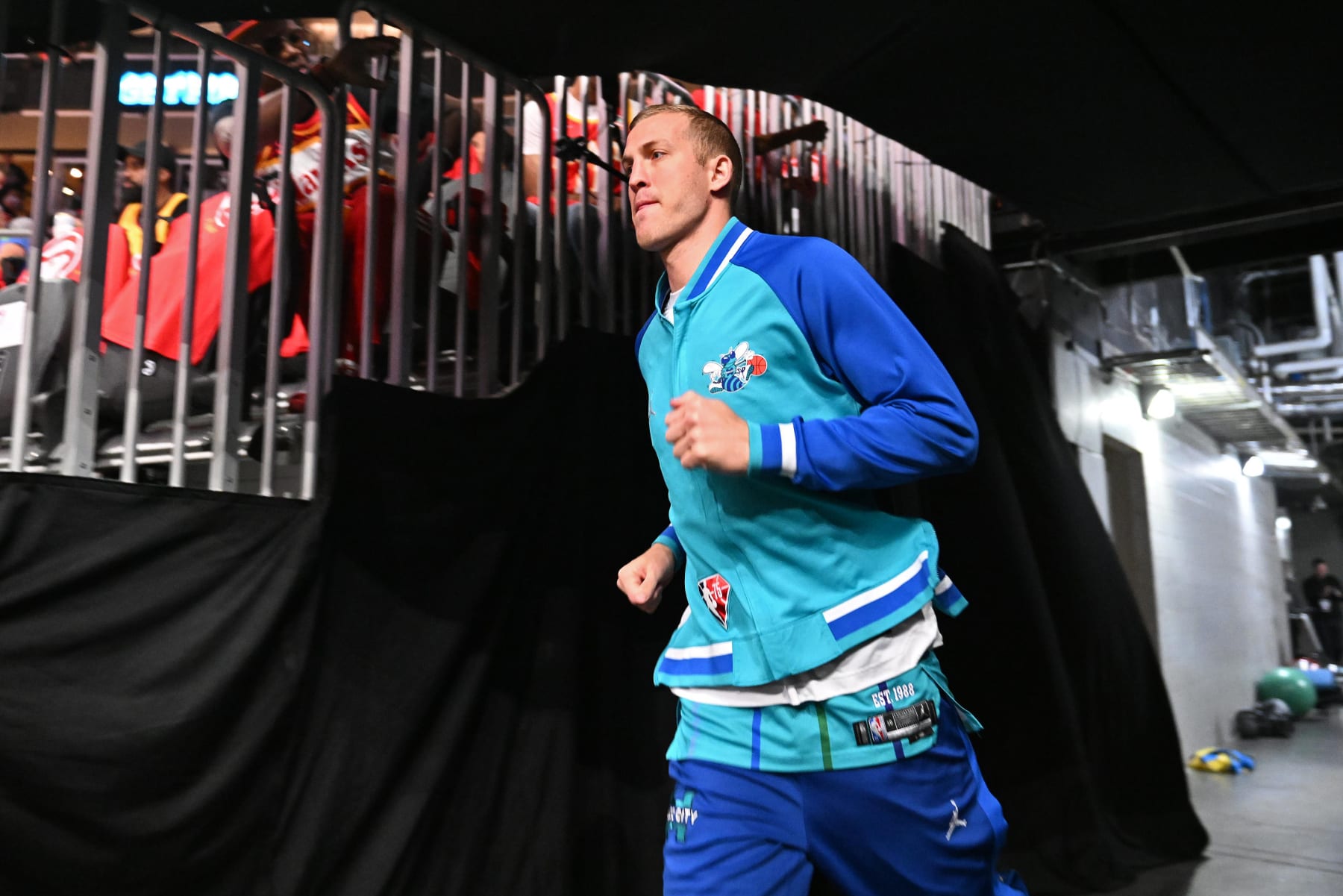 ATLANTA, GA - APRIL 13: Mason Plumlee #24 of the Charlotte Hornets walks onto the court prior to the game against the Atlanta Hawks during the 2022 Play-In Tournament on April 13, 2022 at State Farm Arena in Atlanta, Georgia.  NOTE TO USER: User expressly acknowledges and agrees that, by downloading and/or using this Photograph, user is consenting to the terms and conditions of the Getty Images License Agreement. Mandatory Copyright Notice: Copyright 2022 NBAE (Photo by Adam Hagy/NBAE via Getty Images)