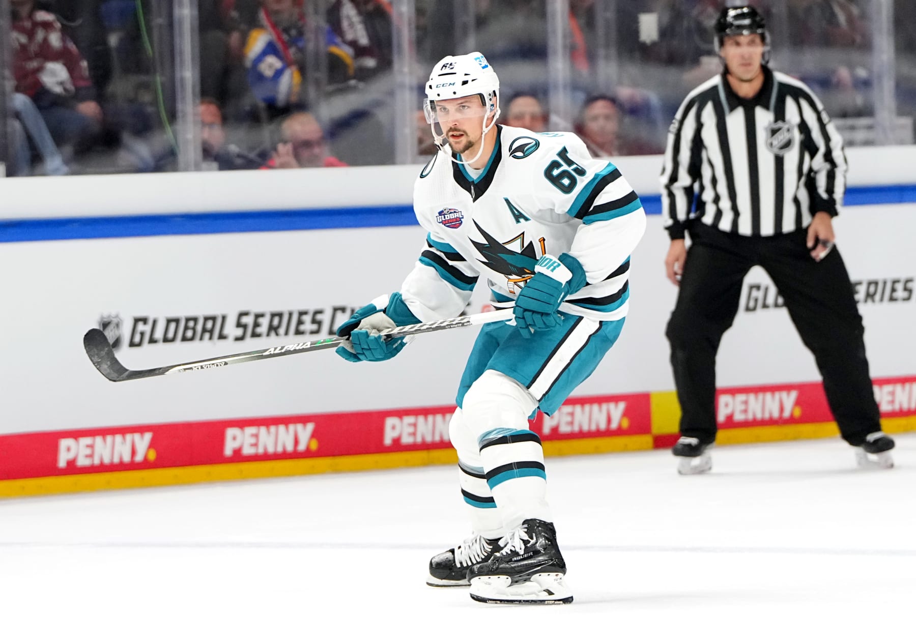 BERLIN, GERMANY - OCTOBER 04: Erik Karlsson #65  of the San Jose Sharks skates during the second period of the NHL Global Series Challenge Germany game against Eisbaren Berlin at Mercedes-Benz Arena on October 04, 2022 in Berlin, Germany. (Photo by Amanda Cain/NHLI via Getty Images)