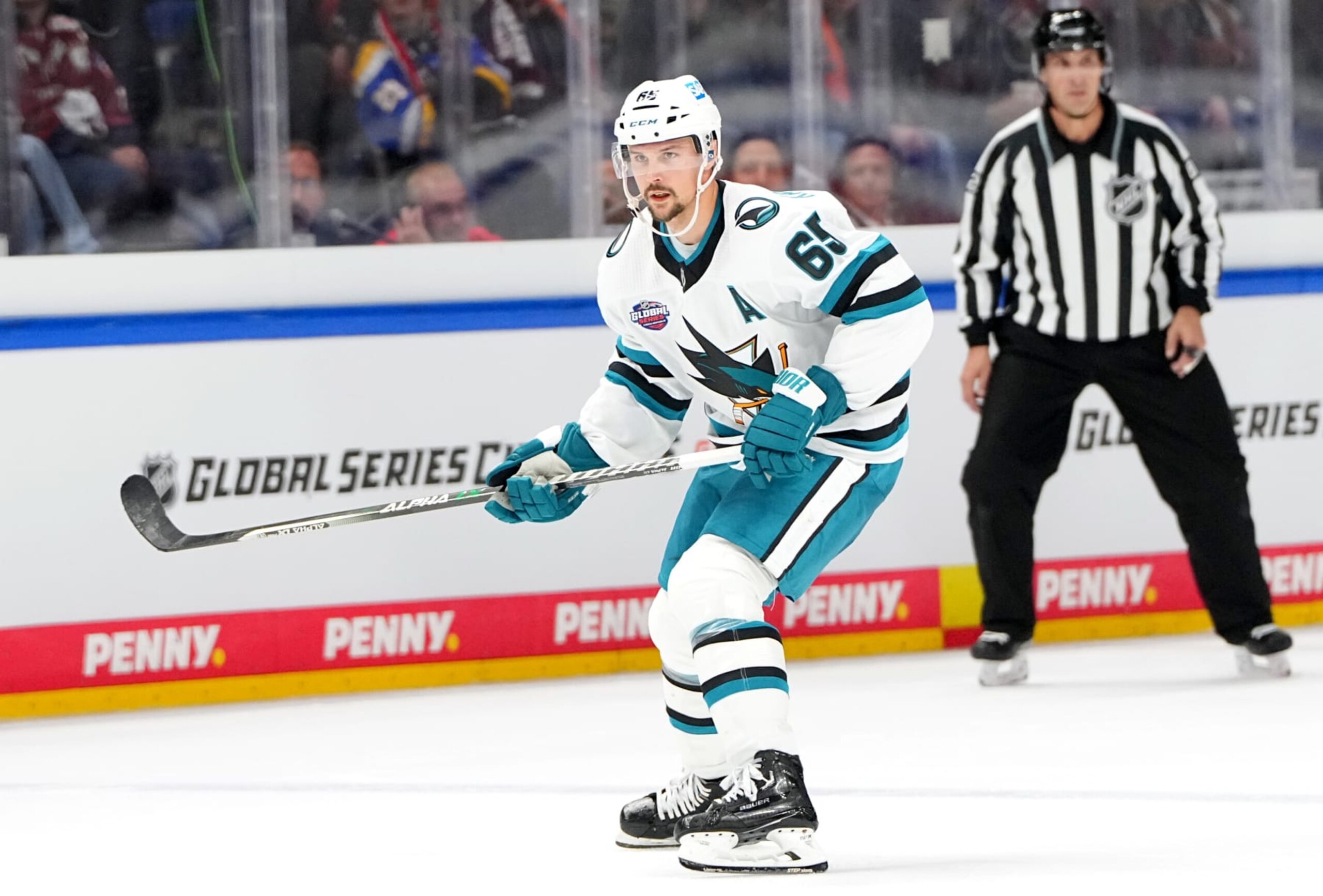 BERLIN, GERMANY - OCTOBER 04: Erik Karlsson #65 of the San Jose Sharks skates during the second period of the NHL Global Series Challenge Germany game against Eisbaren Berlin at Mercedes-Benz Arena on October 04, 2022 in Berlin, Germany. (Photo by Amanda Cain/NHLI via Getty Images) BERLIN, GERMANY - OCTOBER 04: Erik Karlsson #65 of the San Jose Sharks skates during the second period of the NHL Global Series Challenge Germany game against Eisbaren Berlin at Mercedes-Benz Arena on October 04, 2022 in Berlin, Germany. (Photo by Amanda Cain/NHLI via Getty Images)