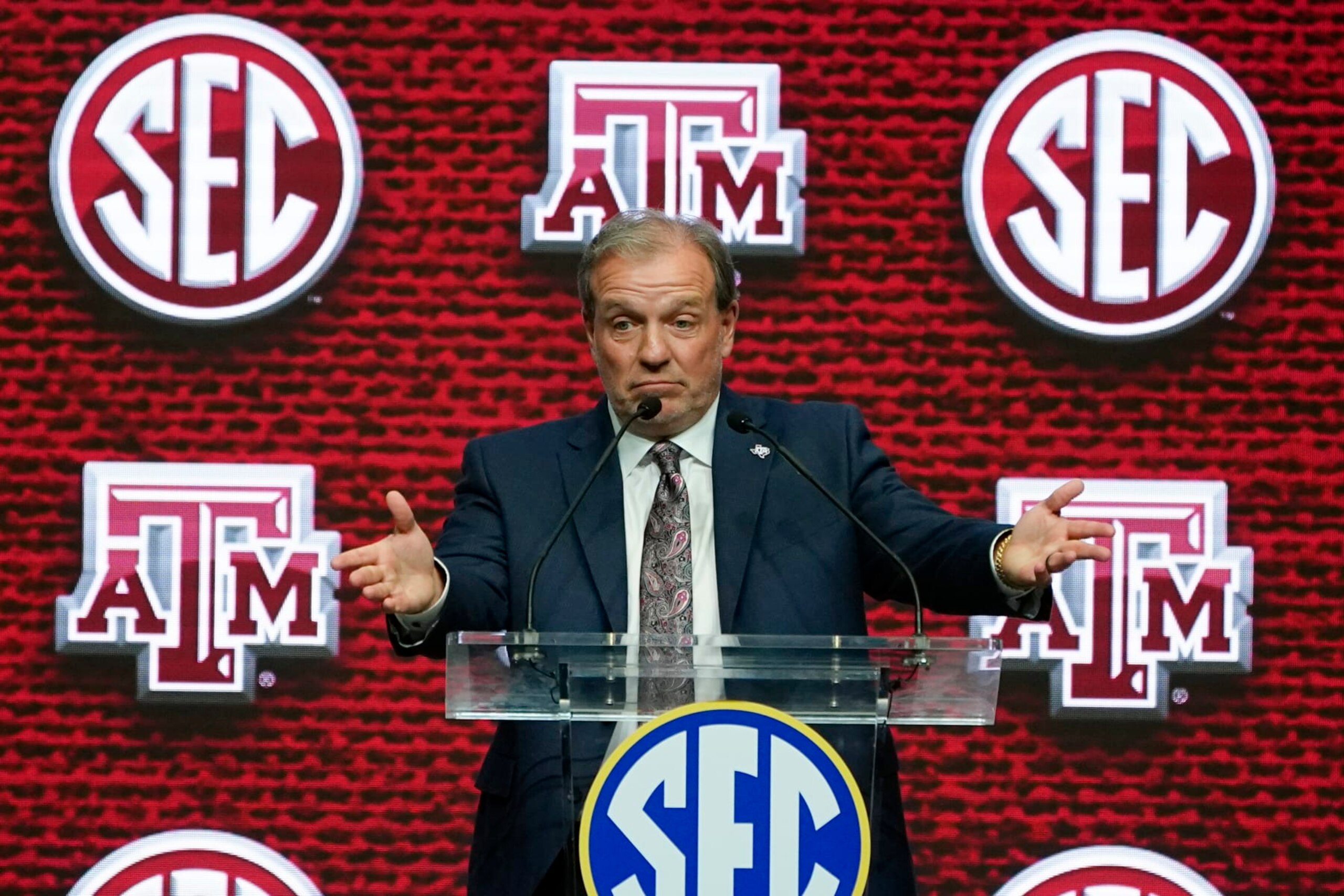 Texas A&M head coach Jimbo Fisher speaks during NCAA college football Southeastern Conference Media Days, Thursday, July 21, 2022, in Atlanta. (AP Photo/John Bazemore)