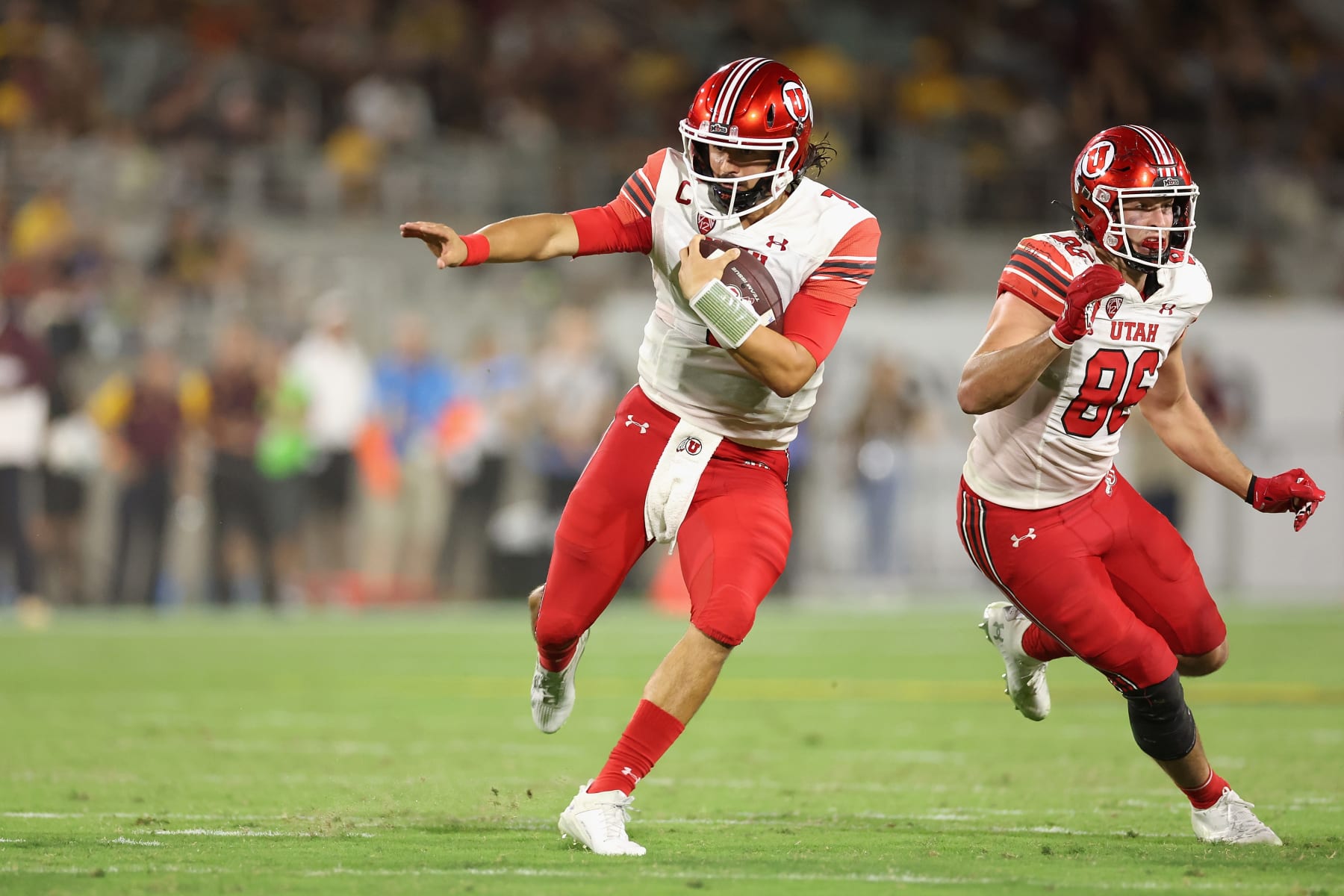 TEMPE, ARIZONA - SEPTEMBER 24: Quarterback Cameron Rising #7 of the Utah Utes rushes the football against the Arizona State Sun Devils during the second half of the NCAAF game at Sun Devil Stadium on September 24, 2022 in Tempe, Arizona. (Photo by Christian Petersen/Getty Images)