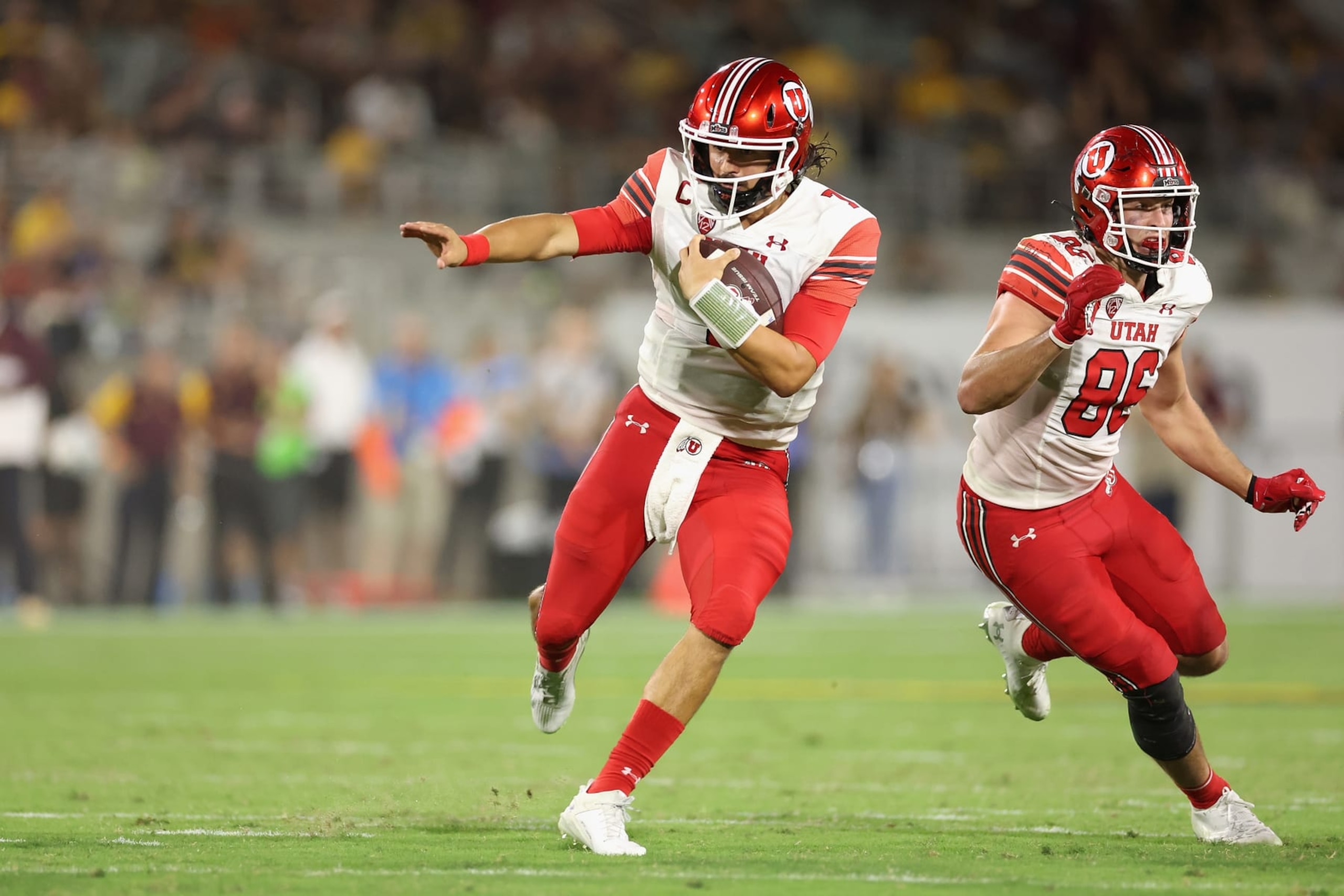 TEMPE, ARIZONA - SEPTEMBER 24: Quarterback Cameron Rising #7 of the Utah Utes rushes the football against the Arizona State Sun Devils during the second half of the NCAAF game at Sun Devil Stadium on September 24, 2022 in Tempe, Arizona. (Photo by Christian Petersen/Getty Images)