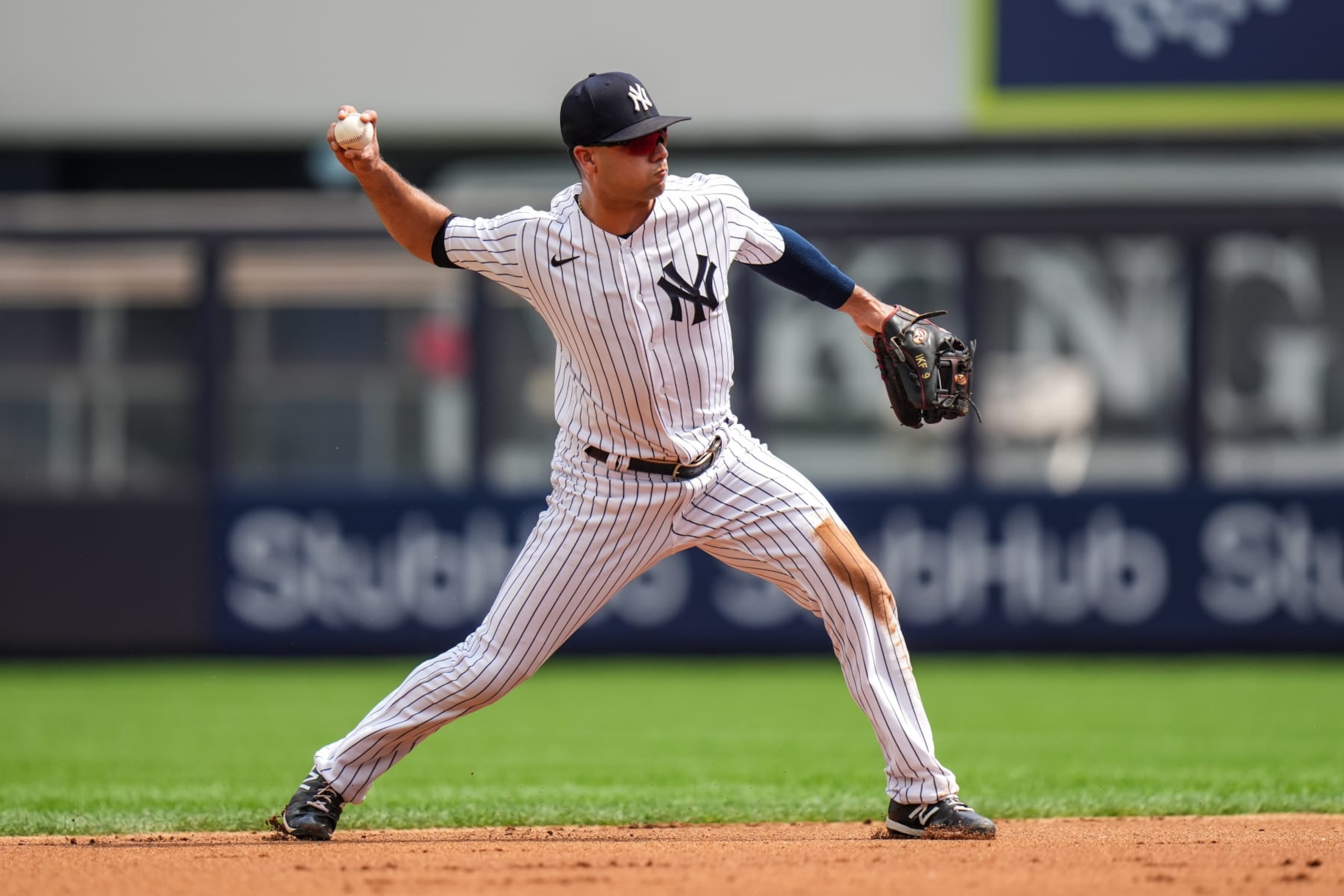 NEW YORK, NY - SEPTEMBER 05: Isiah Kiner-Falefa (12) of the New York Yankees throws against the Minnesota Twins on September 5, 2022 at Yankee Stadium in New York, New York. (Photo by Brace Hemmelgarn/Minnesota Twins/Getty Images) NEW YORK, NY - SEPTEMBER 05: Isiah Kiner-Falefa (12) of the New York Yankees throws against the Minnesota Twins on September 5, 2022 at Yankee Stadium in New York, New York. (Photo by Brace Hemmelgarn/Minnesota Twins/Getty Images)
