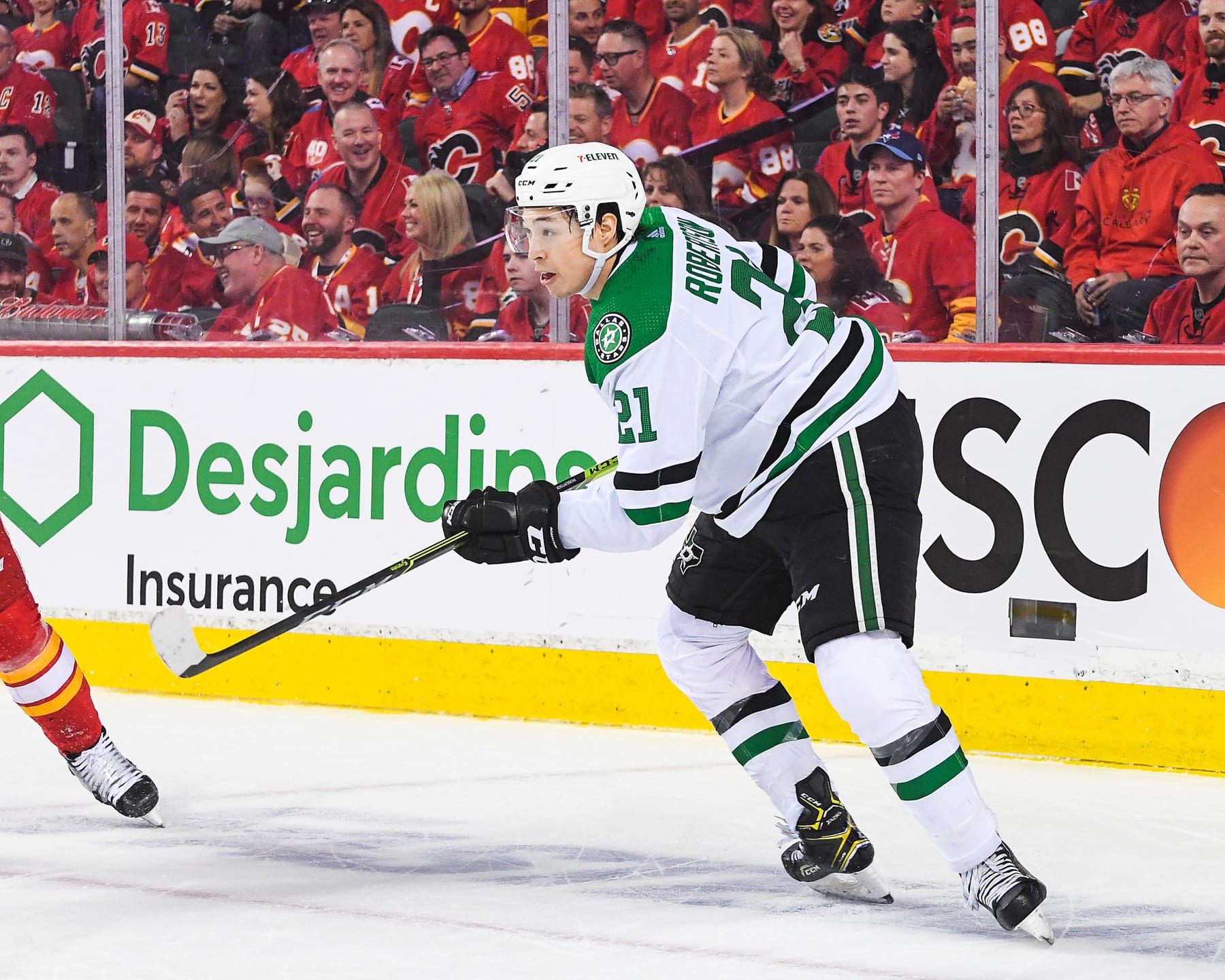 CALGARY, AB - MAY 15: Jason Robertson #21 of the Dallas Stars in action against the Calgary Flames during Game Seven of the First Round of the 2022 Stanley Cup Playoffs at Scotiabank Saddledome on May 15, 2022 in Calgary, Alberta, Canada. The Flames defeated the Stars 3-2 in overtime. (Photo by Derek Leung/Getty Images)