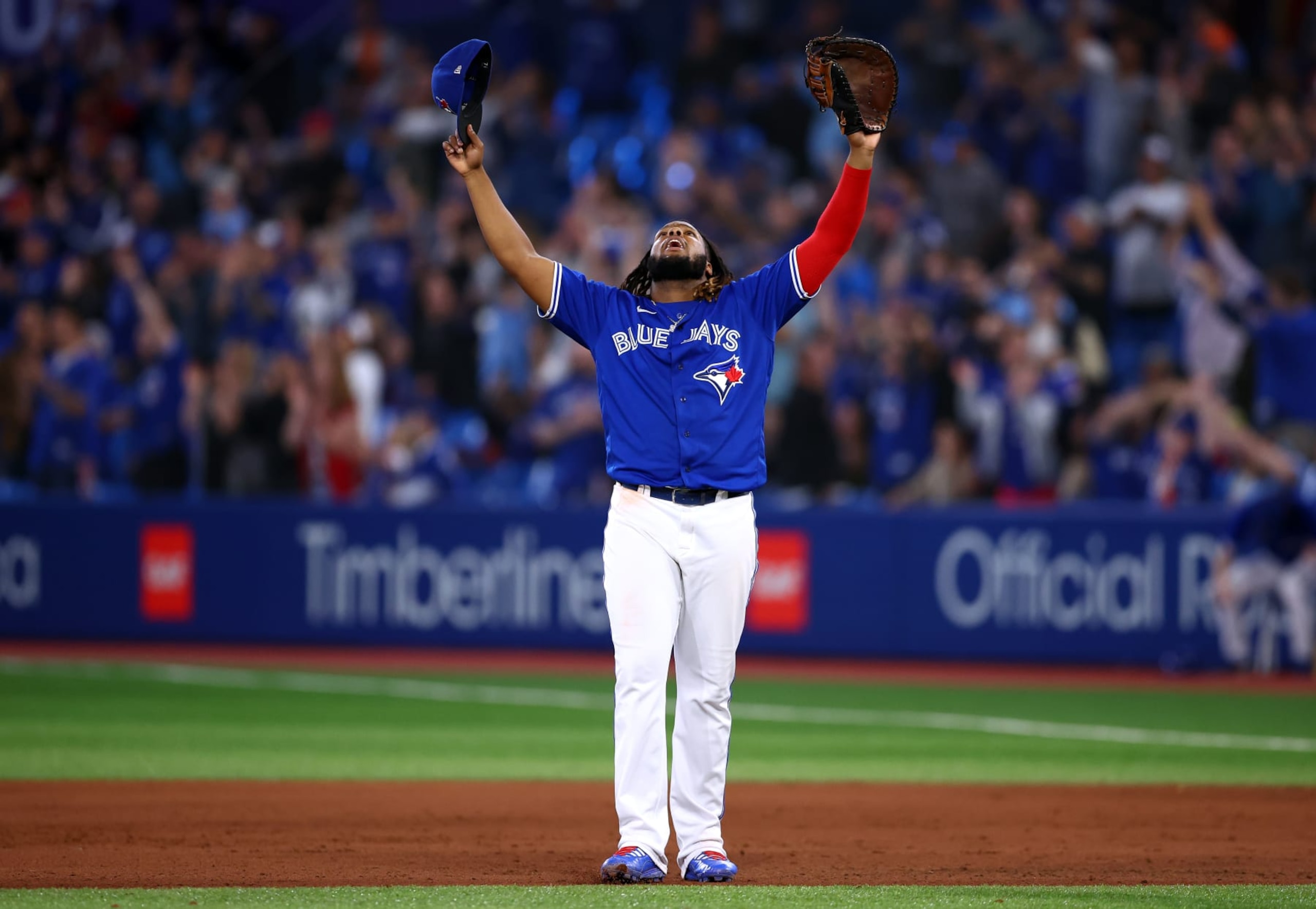 TORONTO, ON - SEPTEMBER 30:  Vladimir Guerrero Jr. #27 of the Toronto Blue Jays celebrates clinching a playoff spot after the win against the Boston Red Sox at Rogers Centre on September 30, 2022 in Toronto, Ontario, Canada.  (Photo by Vaughn Ridley/Getty Images)