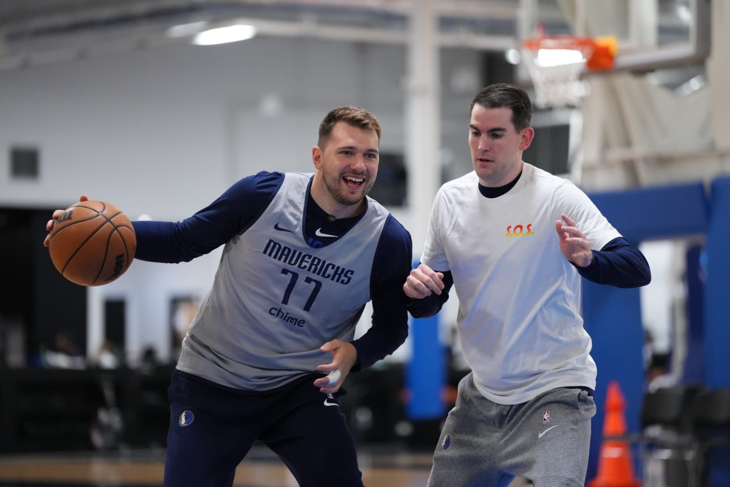 DALLAS, TX - SEPTEMBER 30: Luka Doncic #77 of the Dallas Mavericks participates during practice on September 30, 2022 at the Dallas Mavericks Practice Facility in Dallas, Texas. NOTE TO USER: User expressly acknowledges and agrees that, by downloading and or using this photograph, User is consenting to the terms and conditions of the Getty Images License Agreement. Mandatory Copyright Notice: Copyright 2022 NBAE (Photo by Cooper Neill/NBAE via Getty Images) DALLAS, TX - SEPTEMBER 30: Luka Doncic #77 of the Dallas Mavericks participates during practice on September 30, 2022 at the Dallas Mavericks Practice Facility in Dallas, Texas. NOTE TO USER: User expressly acknowledges and agrees that, by downloading and or using this photograph, User is consenting to the terms and conditions of the Getty Images License Agreement. Mandatory Copyright Notice: Copyright 2022 NBAE (Photo by Cooper Neill/NBAE via Getty Images)