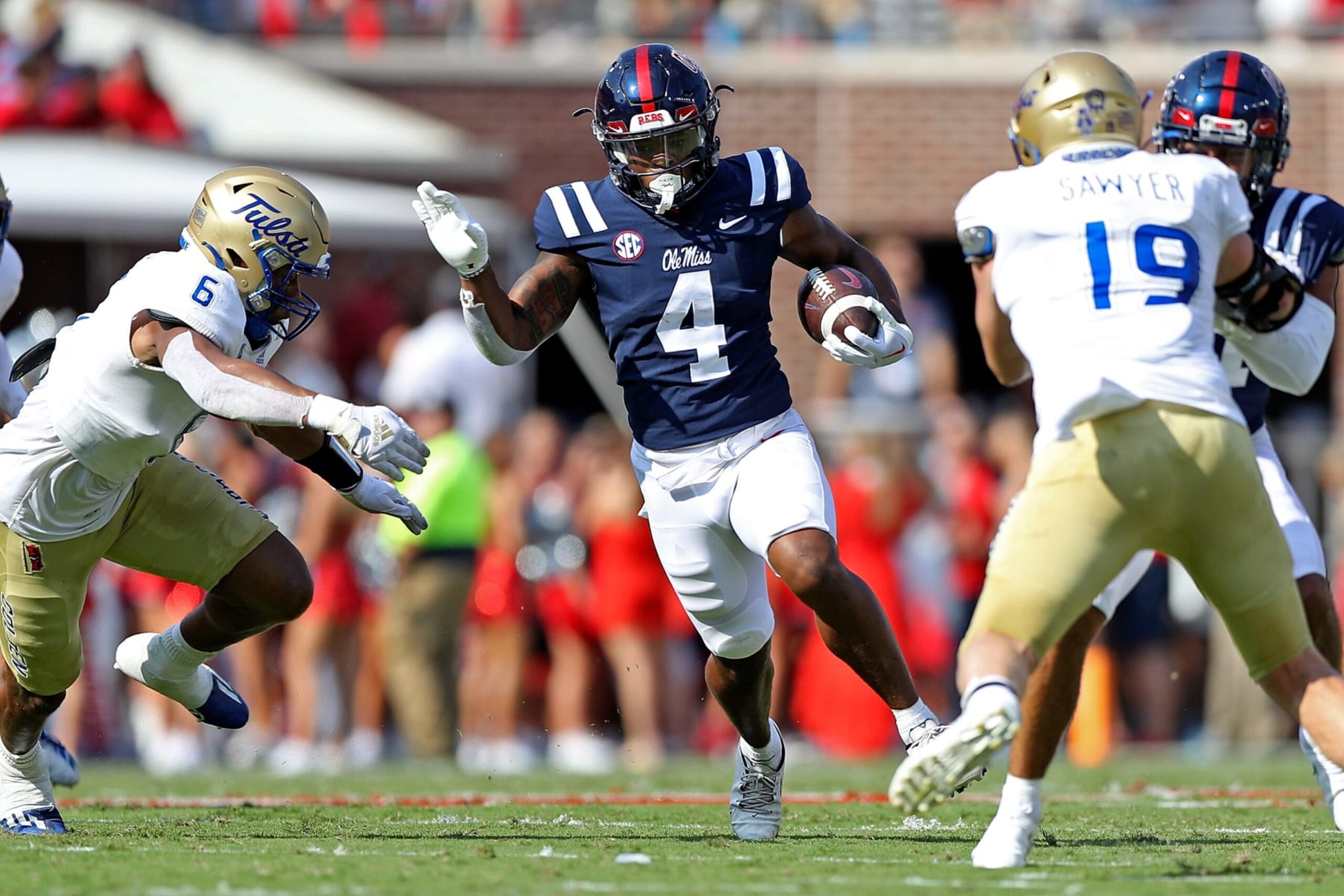 OXFORD, MISSISSIPPI - SEPTEMBER 24: Quinshon Judkins #4 of the Mississippi Rebels carries the ball during the first half against the Tulsa Golden Hurricane at Vaught-Hemingway Stadium on September 24, 2022 in Oxford, Mississippi. (Photo by Justin Ford/Getty Images)
