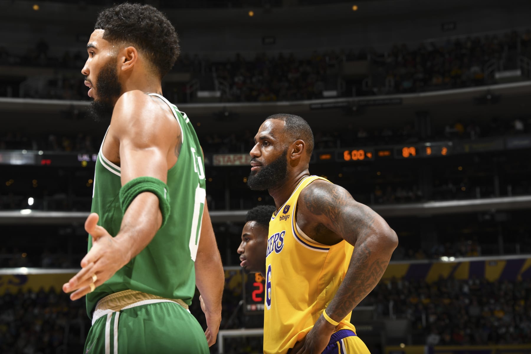 LOS ANGELES, CA - DECEMBER 7: Jayson Tatum #0 of the Boston Celtics and LeBron James #6 of the Los Angeles Lakers look on during the game on December 7, 2021 at STAPLES Center in Los Angeles, California. NOTE TO USER: User expressly acknowledges and agrees that, by downloading and/or using this Photograph, user is consenting to the terms and conditions of the Getty Images License Agreement. Mandatory Copyright Notice: Copyright 2021 NBAE (Photo by Andrew D. Bernstein/NBAE via Getty Images)