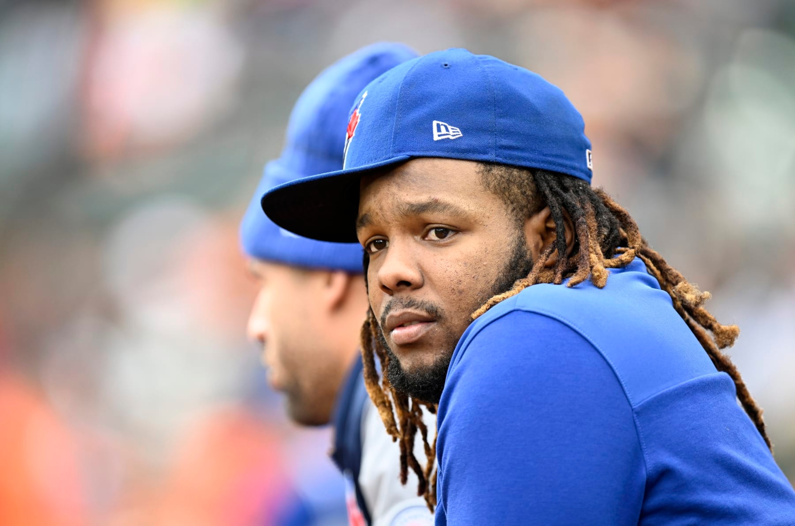 BALTIMORE, MARYLAND - OCTOBER 05: Vladimir Guerrero Jr. #27 of the Toronto Blue Jays watches the game in the second inning against the Baltimore Orioles during game two of a doubleheader at Oriole Park at Camden Yards on October 05, 2022 in Baltimore, Maryland. (Photo by Greg Fiume/Getty Images)