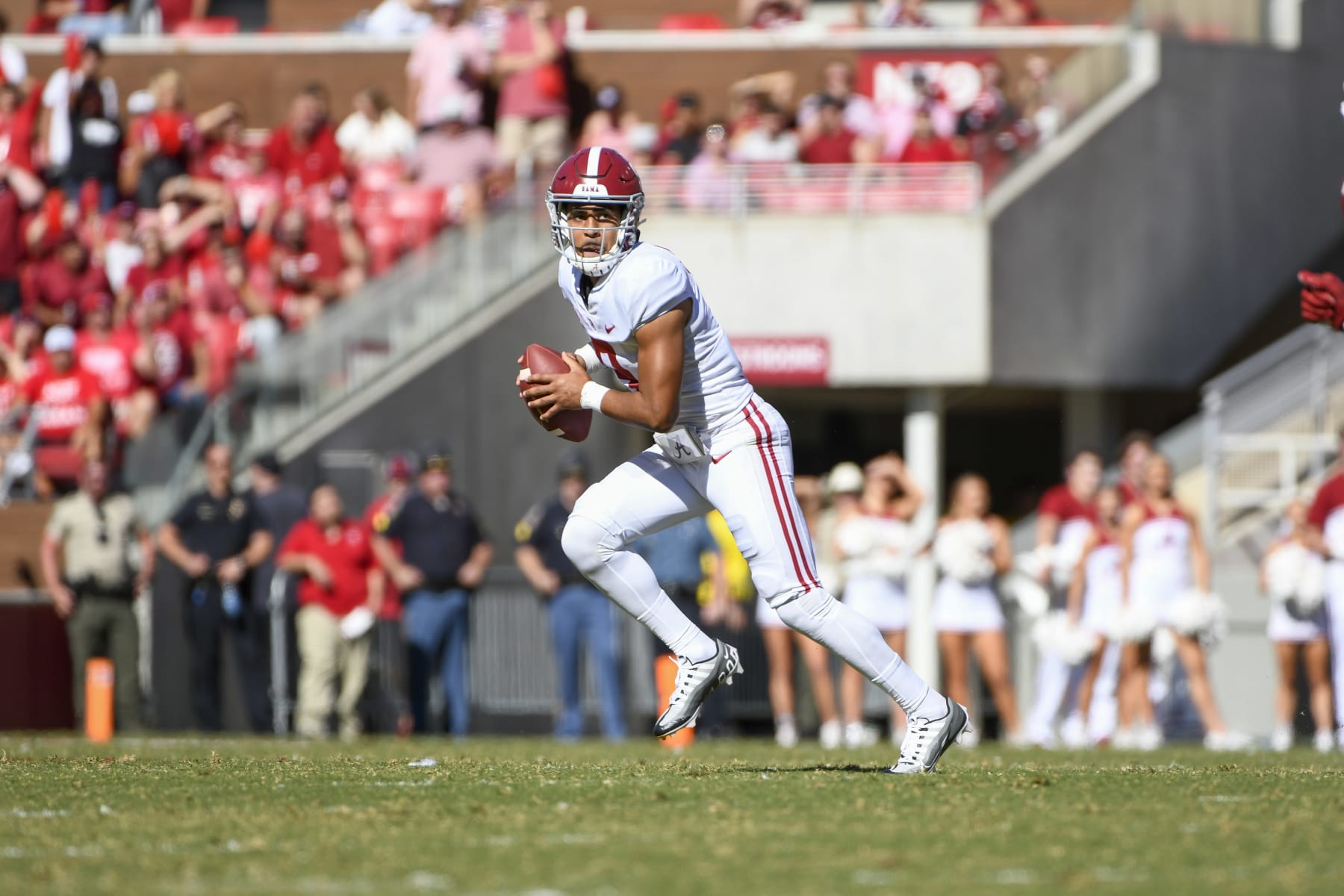 FAYETTEVILLE, AR - OCTOBER 01: Alabama Crimson Tide quarterback Bryce Young (9) scrambles during the college football game between the Alabama Crimson Tide and Arkansas Razorbacks on October 1, 2022, at Donald W. Reynolds Razorback Stadium in Fayetteville, Arkansas. (Photo by Andy Altenburger/Icon Sportswire via Getty Images) FAYETTEVILLE, AR - OCTOBER 01: Alabama Crimson Tide quarterback Bryce Young (9) scrambles during the college football game between the Alabama Crimson Tide and Arkansas Razorbacks on October 1, 2022, at Donald W. Reynolds Razorback Stadium in Fayetteville, Arkansas. (Photo by Andy Altenburger/Icon Sportswire via Getty Images)