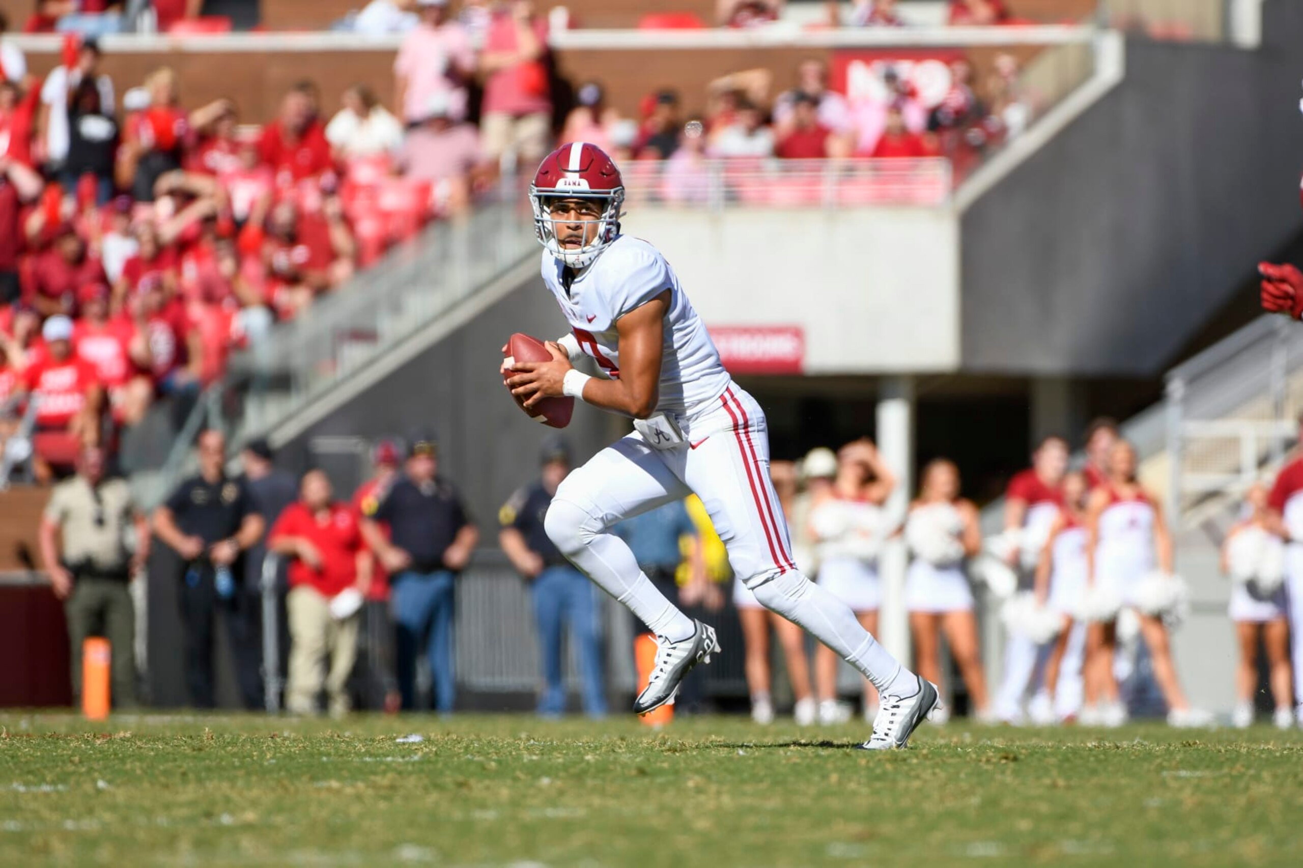 FAYETTEVILLE, AR - OCTOBER 01: Alabama Crimson Tide quarterback Bryce Young (9) scrambles during the college football game between the Alabama Crimson Tide and Arkansas Razorbacks on October 1, 2022, at Donald W. Reynolds Razorback Stadium in Fayetteville, Arkansas. (Photo by Andy Altenburger/Icon Sportswire via Getty Images)