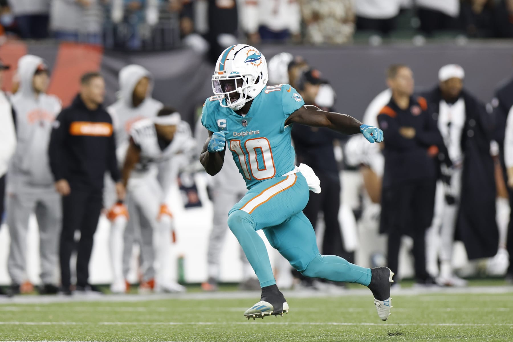 Miami Dolphins wide receiver Tyreek Hill (10) runs a pass route during an NFL football game against the Cincinnati Bengals on Thursday, September 29, 2022, in Cincinnati. (AP Photo/Matt Patterson)