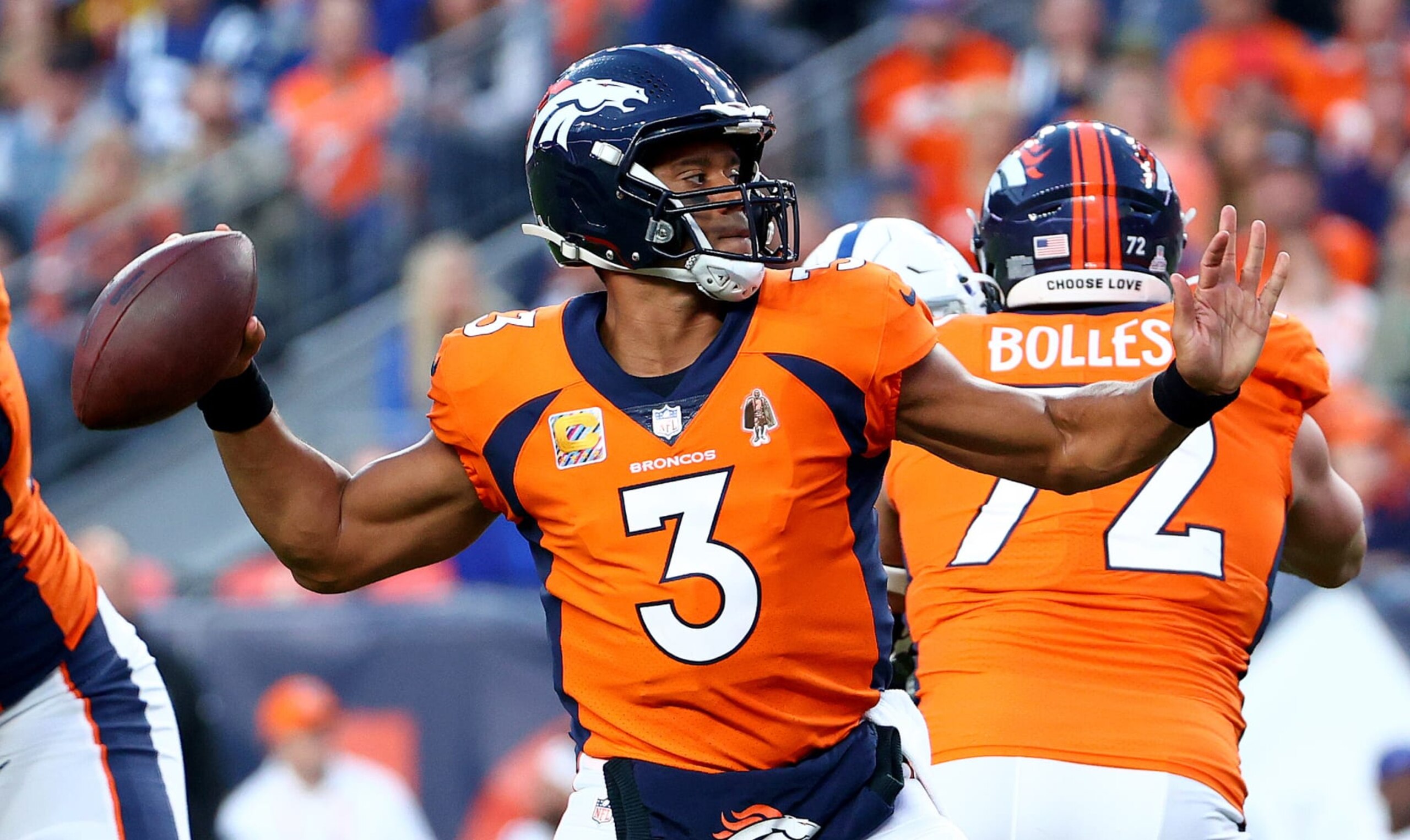 DENVER, COLORADO - OCTOBER 06: Russell Wilson #3 of the Denver Broncos passes during a game against the Indianapolis Colts at Empower Field At Mile High on October 06, 2022 in Denver, Colorado. (Photo by Justin Tafoya/Getty Images)