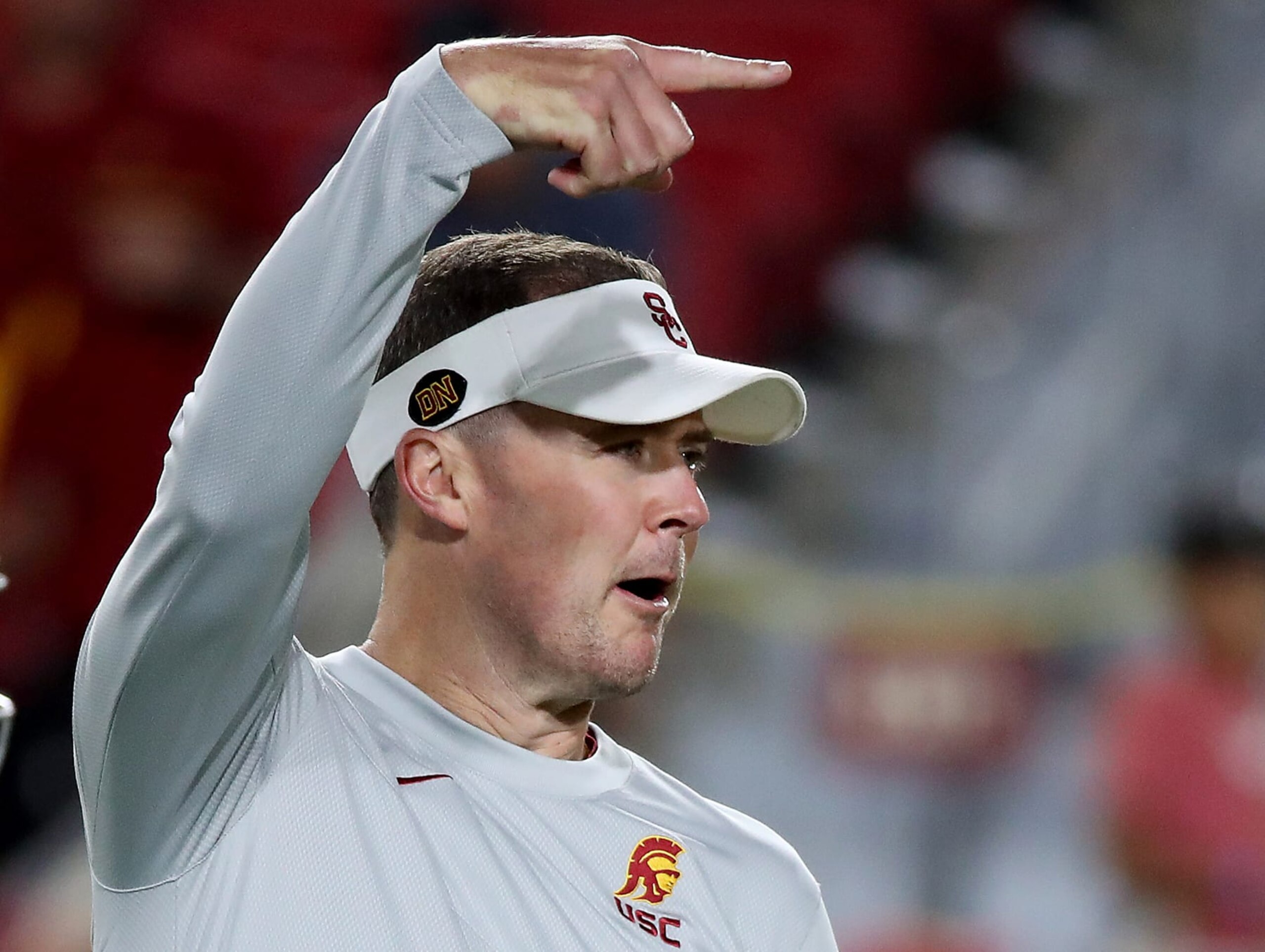 LOS ANGELES, CALIF. - OCT. 1, 2022. USC head coach Lincoln Riley watches the Trojans warm up before the game against Arizona State at the Los Angeles Memorial Coliseum on Saturday night, Oct. 1, 2022. (Luis Sinco / Los Angeles Times via Getty Images)