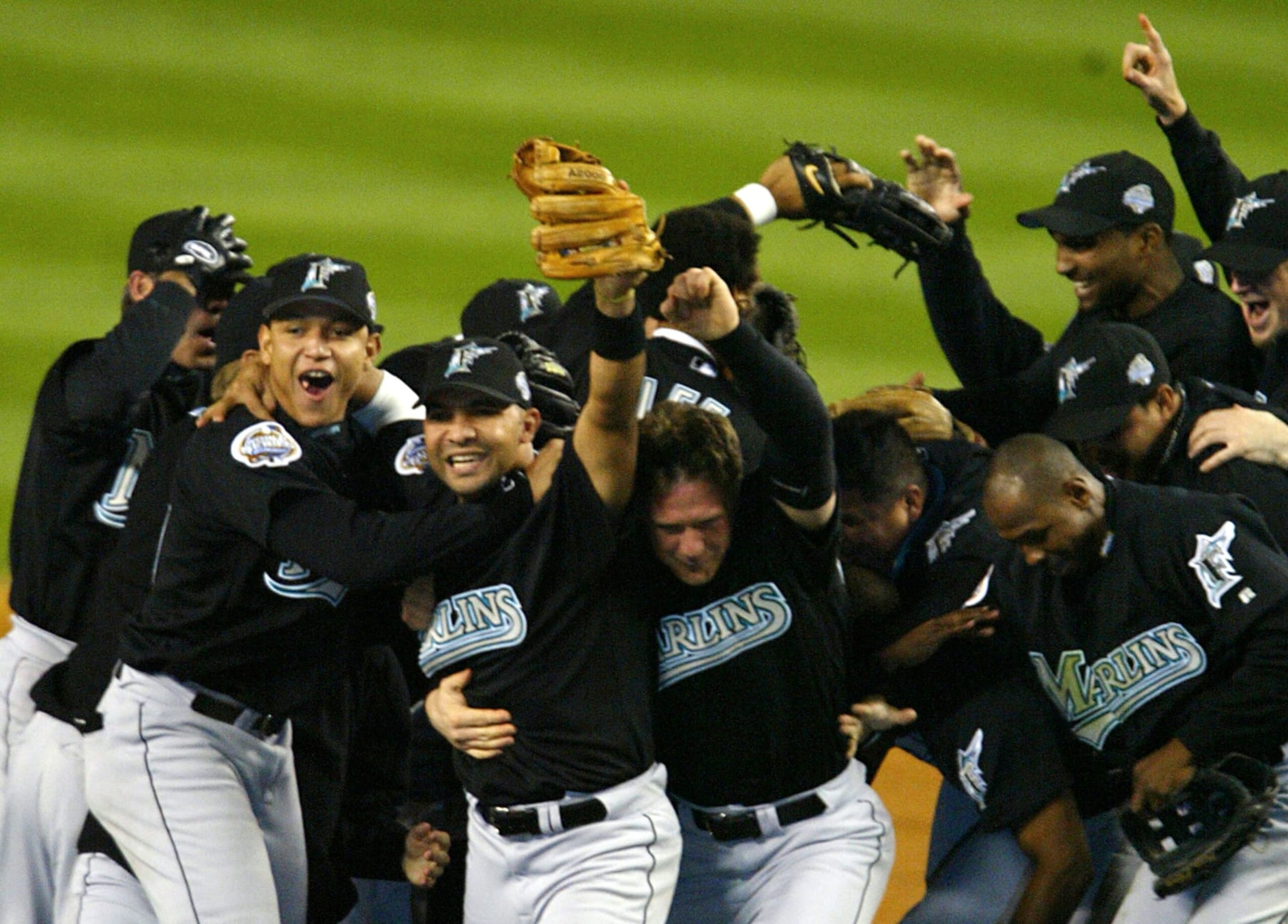 BRONX, NY - OCTOBER 25:  The Florida Marlins celebrate their 2-0 win over the New York Yankees in game six of the Major League Baseball World Series on October 25, 2003 at Yankee Stadium in the Bronx, New York.  (Photo by Doug Pensinger/Getty Images)