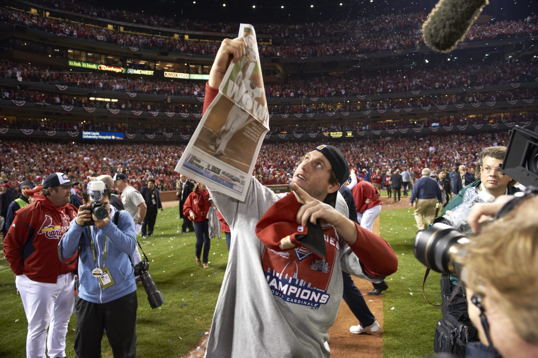 Baseball: World Series: St. Louis Cardinals David Freese (23) victorious on field, holding newspaper with headline reading WOW!, after game vs Texas Rangers at Busch Stadium. Game 7.
St. Louis, MO 10/28/2011
CREDIT: David E. Klutho (Photo by David E. Klutho /Sports Illustrated via Getty Images)
(Set Number: X86551 TK4 R4 F131 )