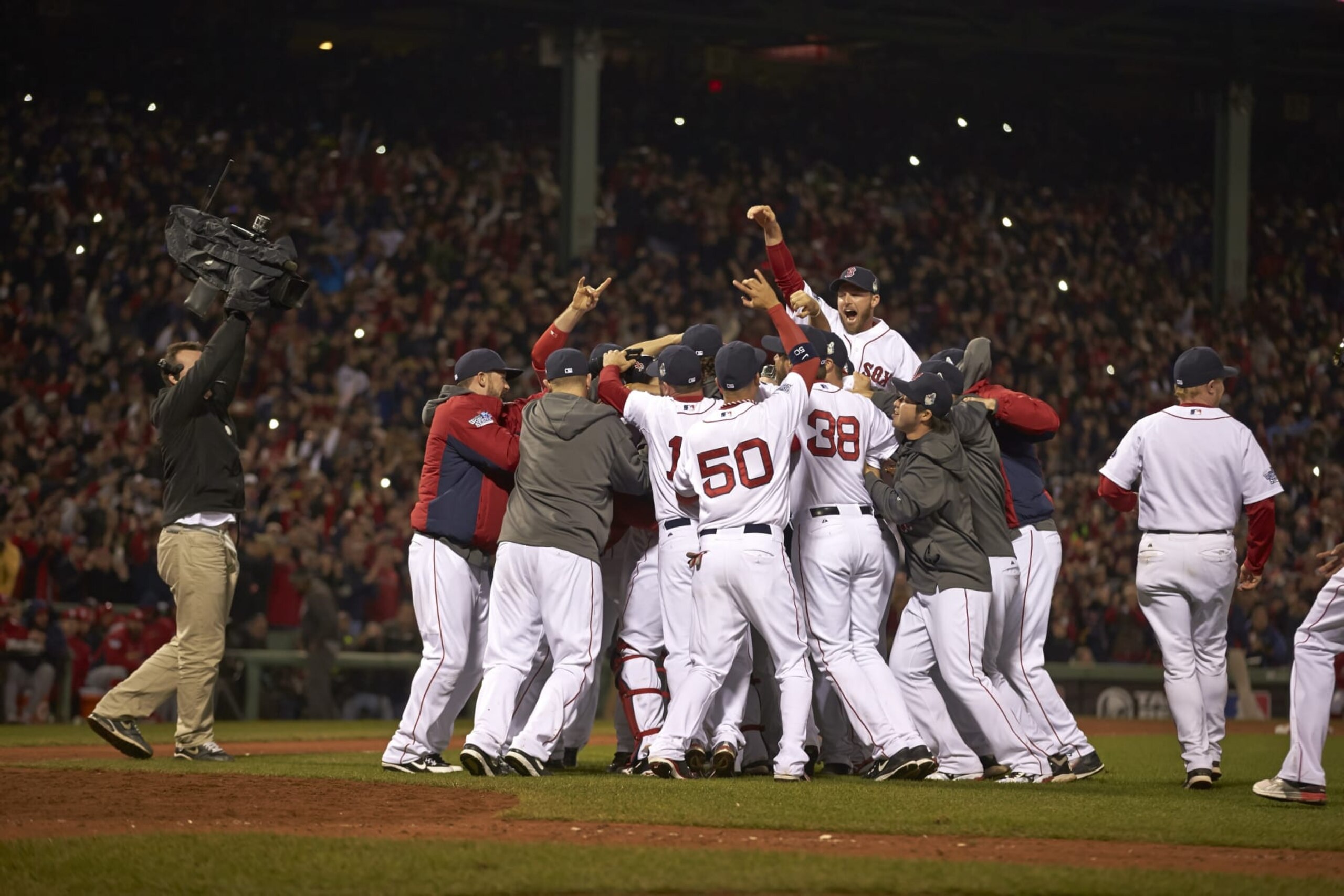 Baseball: World Series: View of Boston Red Sox players victorious on field after winning Game 6 and championship series vs St. Louis Cardinals at Fenway Park.
Boston, MA 10/30/2013
CREDIT: Damian Strohmeyer (Photo by Damian Strohmeyer /Sports Illustrated via Getty Images)
(Set Number: X157103 TK3 R1 F26 )