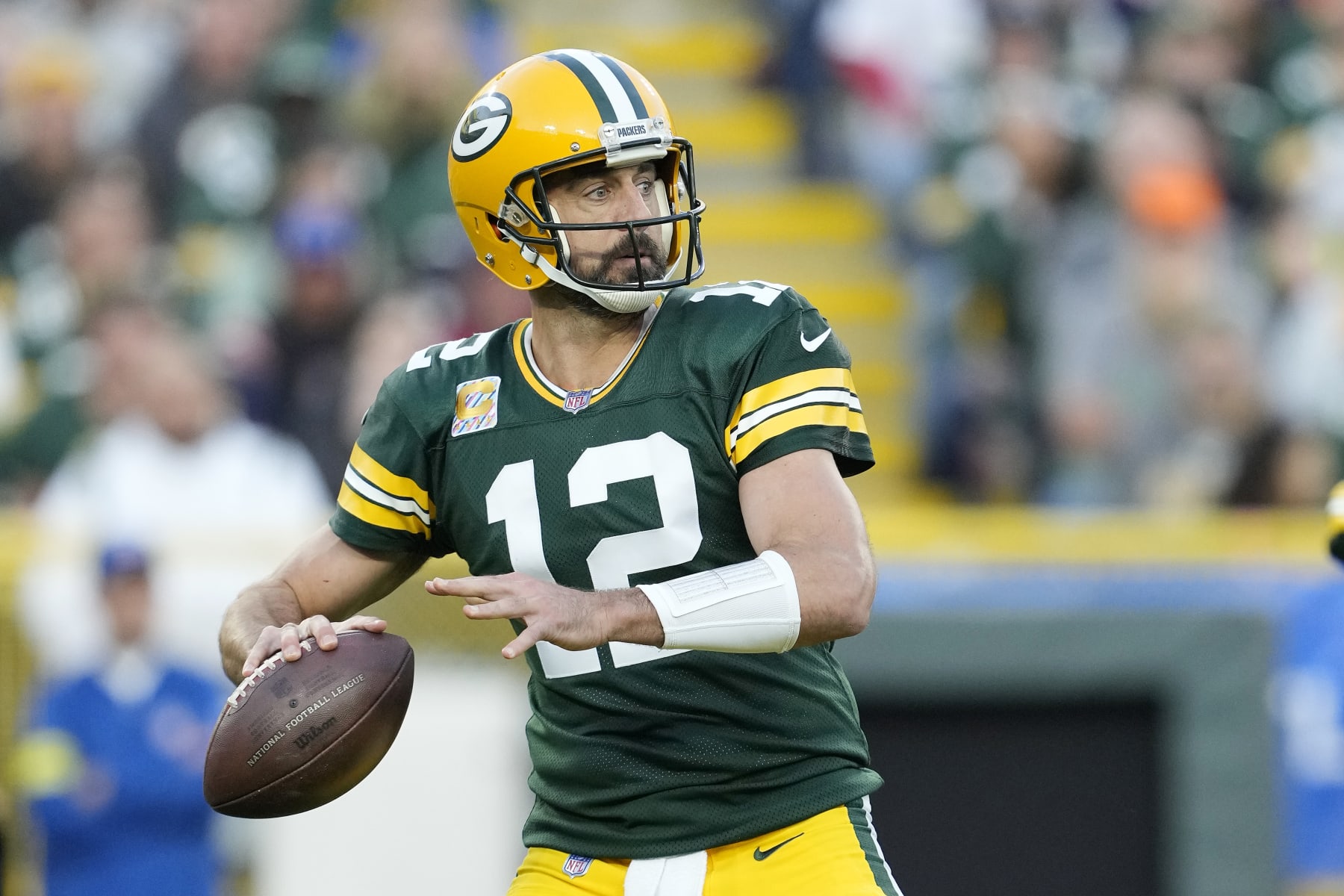 GREEN BAY, WISCONSIN - OCTOBER 02: Aaron Rodgers #12 of the Green Bay Packers throws a pass in the second half against the New England Patriots at Lambeau Field on October 02, 2022 in Green Bay, Wisconsin. (Photo by Patrick McDermott/Getty Images)