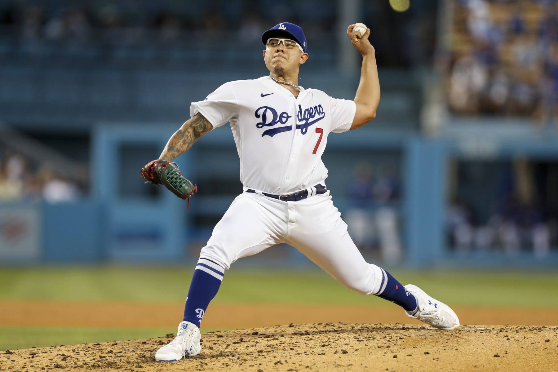 LOS ANGELES, CA - SEPTEMBER 03: Los Angeles Dodgers starting pitcher Julio Urias (7) pitches the ball during a regular season game between the San Diego Padres and Los Angeles Dodgers on September 03, 2022, at Dodger Stadium in Los Angeles, CA. (Photo by Brandon Sloter/Icon Sportswire via Getty Images)