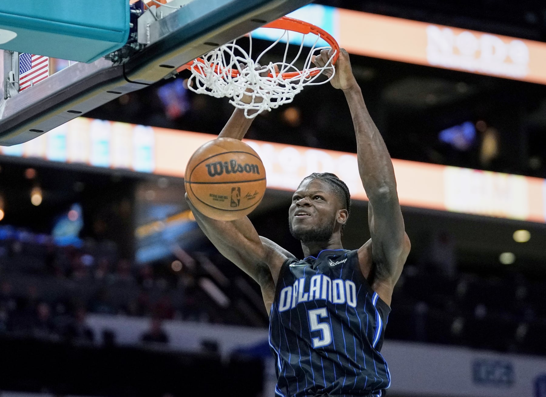 Orlando Magic center Mo Bamba (5) dunks during an NBA basketball game against the Charlotte Hornets on Thursday, April 7, 2022, in Charlotte, N.C. (AP Photo/Rusty Jones)