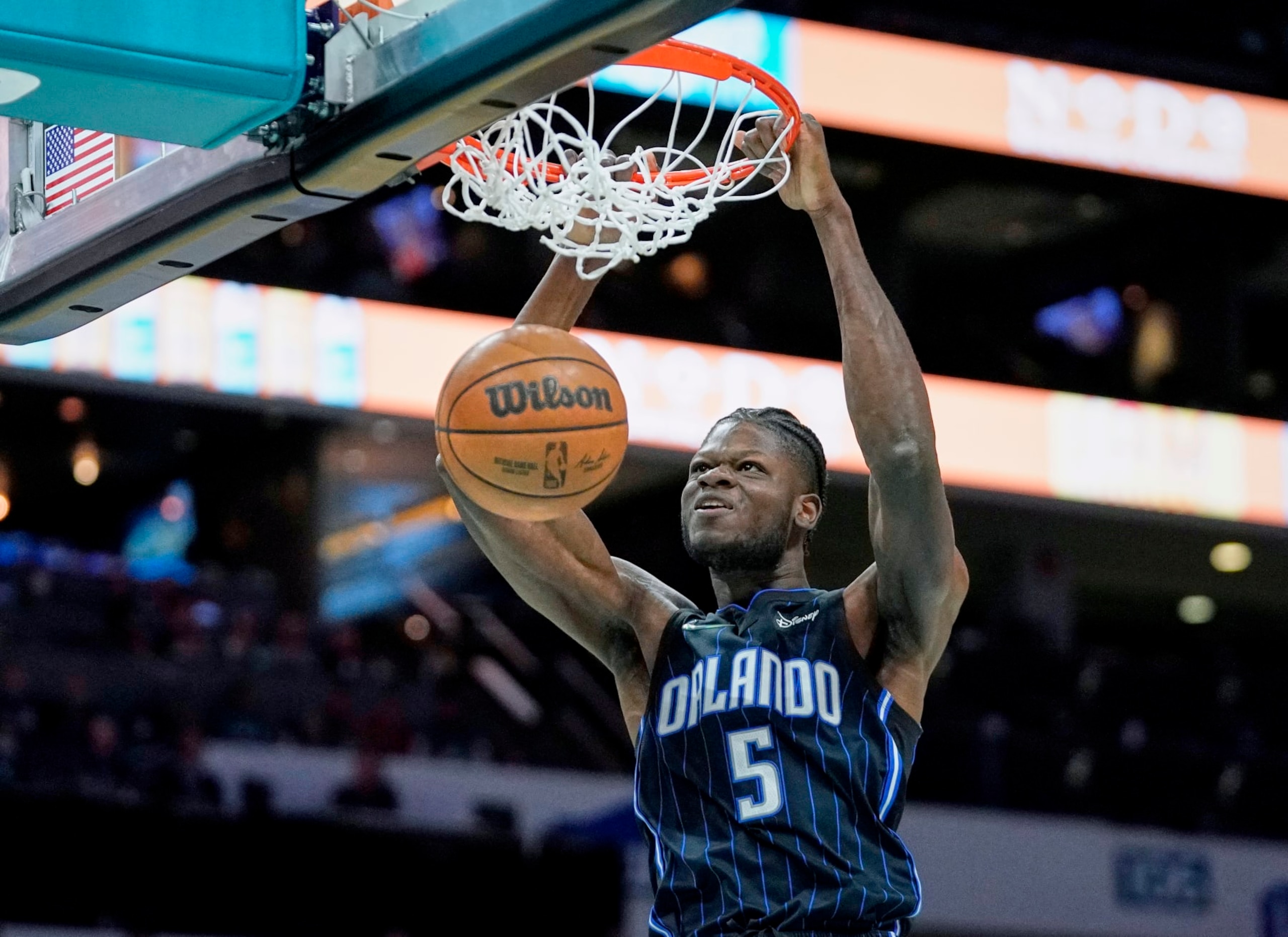 Orlando Magic center Mo Bamba (5) dunks during an NBA basketball game against the Charlotte Hornets on Thursday, April 7, 2022, in Charlotte, N.C. (AP Photo/Rusty Jones)