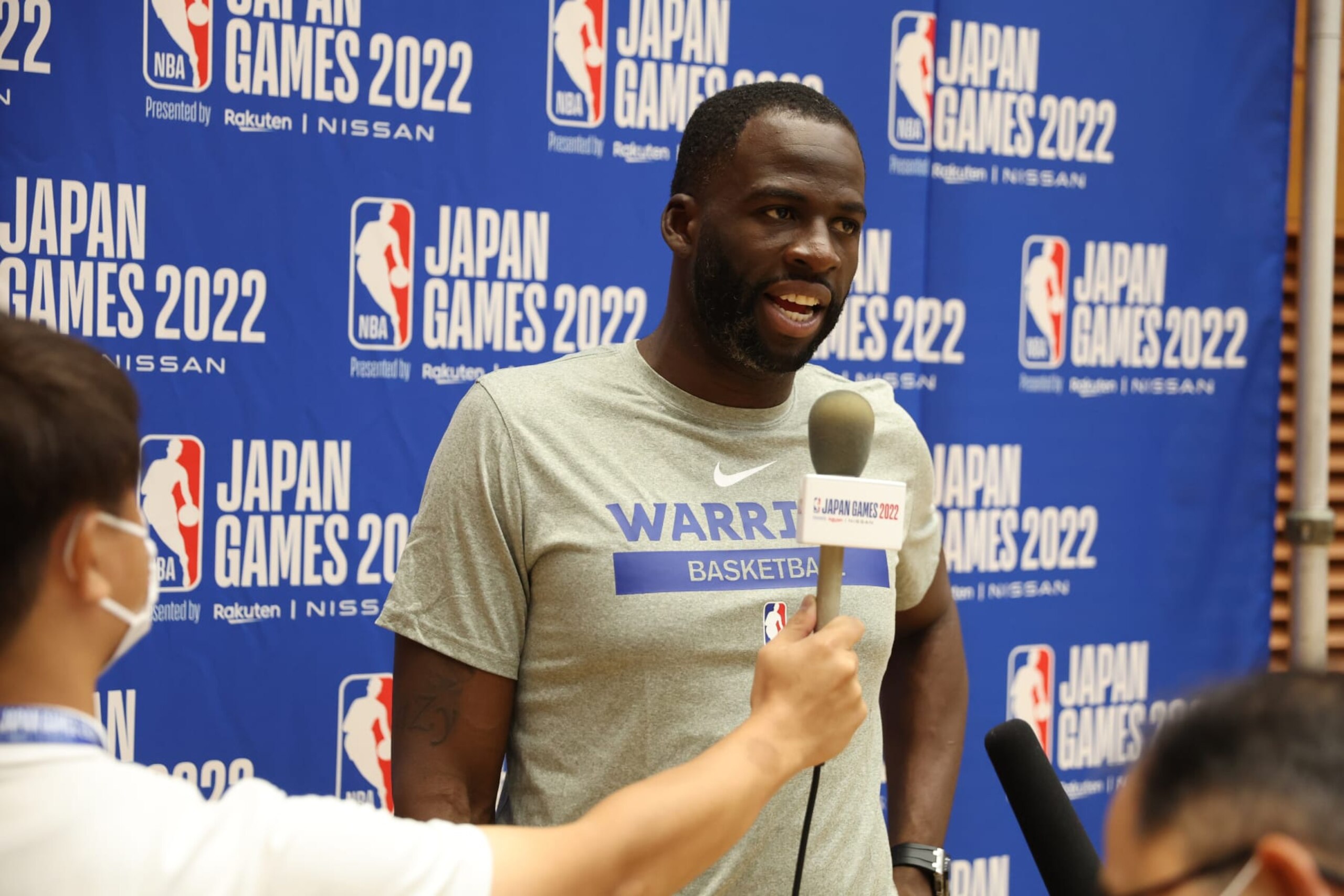 TOKYO, JAPAN - SEPTEMBER 29: Draymond Green of the Golden State Warriors speaks the media during practice at Minato Sports Center on September 29, 2022 in Tokyo, Japan. NOTE TO USER: User expressly acknowledges and agrees that, by downloading and/or using this Photograph, user is consenting to the terms and conditions of the Getty Images License Agreement. Mandatory Copyright Notice: Copyright 2022 NBAE (Photo by Stephen Gosling/NBAE via Getty Images)