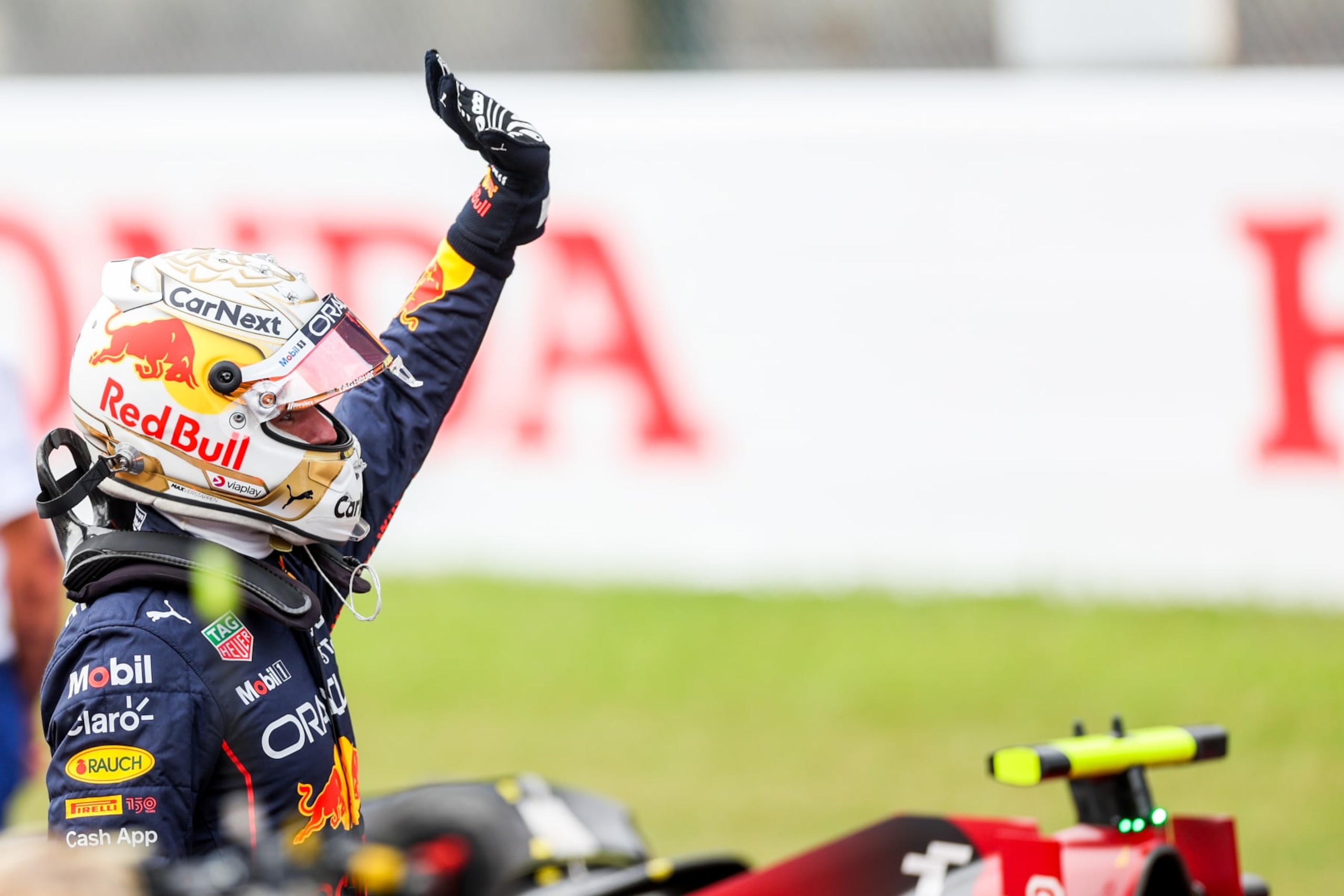 SUZUKA, JAPAN - OCTOBER 08: Max Verstappen of Red Bull Racing and The Netherlands celebrates pole position during qualifying ahead of the F1 Grand Prix of Japan at Suzuka International Racing Course on October 08, 2022 in Suzuka, Japan. (Photo by Peter Fox/Getty Images )
