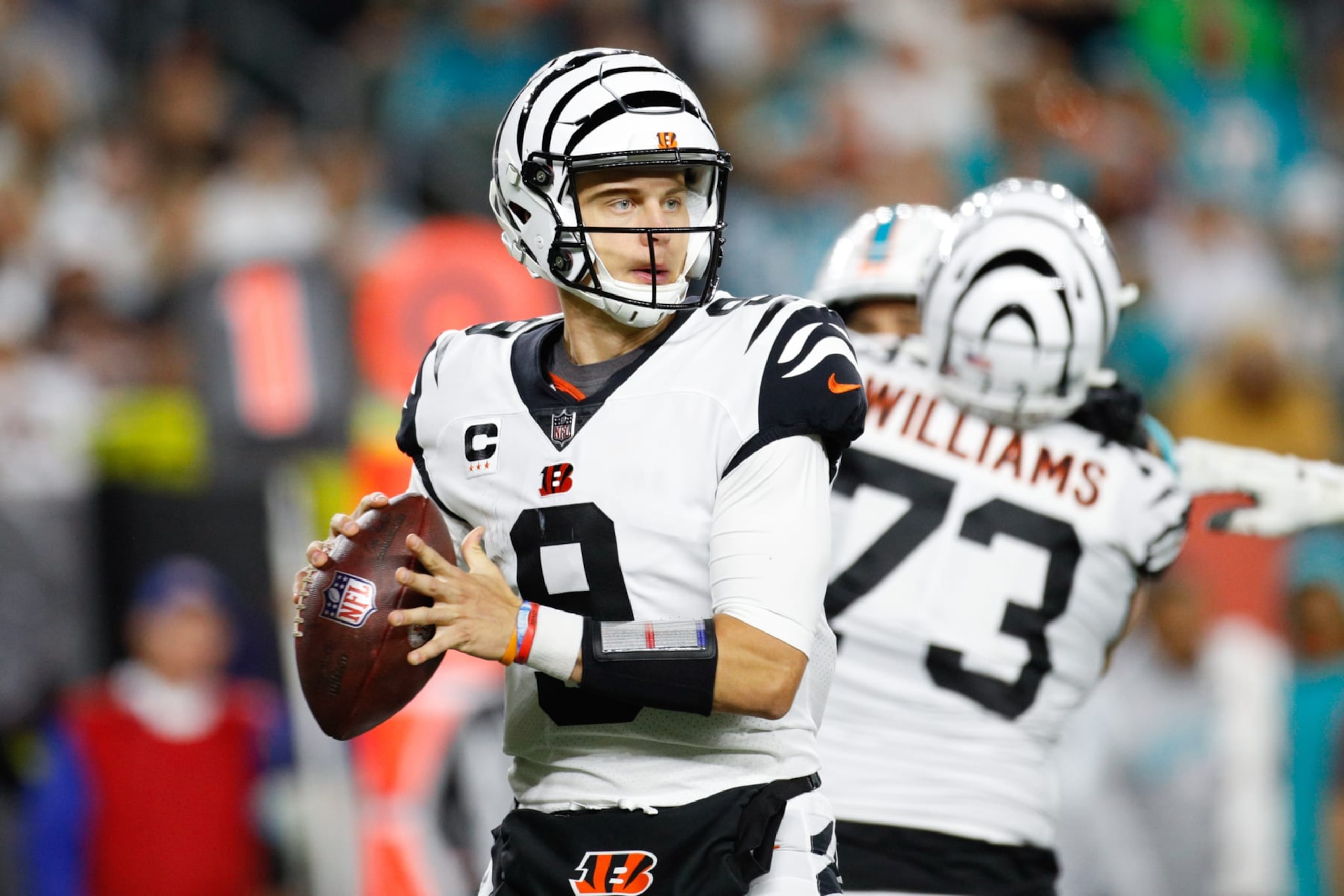 CINCINNATI, OH - SEPTEMBER 29: Cincinnati Bengals quarterback Joe Burrow (9) looks to pass during the game against the Miami Dolphins and the Cincinnati Bengals on September 29, 2022, at Paycor Stadium in Cincinnati, OH.  (Photo by Ian Johnson/Icon Sportswire via Getty Images)