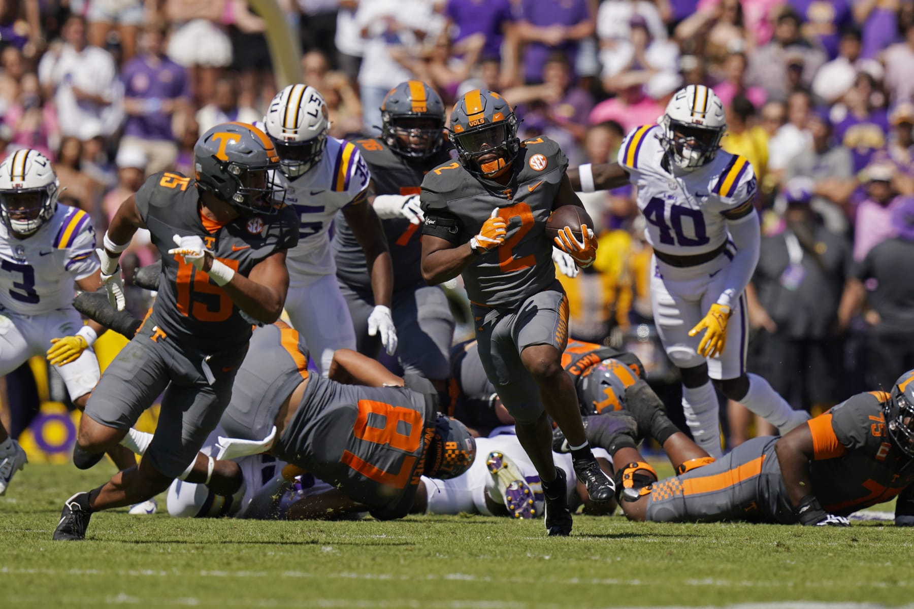 Tennessee running back Jabari Small (2) carries for a long gain in the first half of an NCAA college football game against LSU in Baton Rouge, La., Saturday, Oct. 8, 2022. (AP Photo/Gerald Herbert)