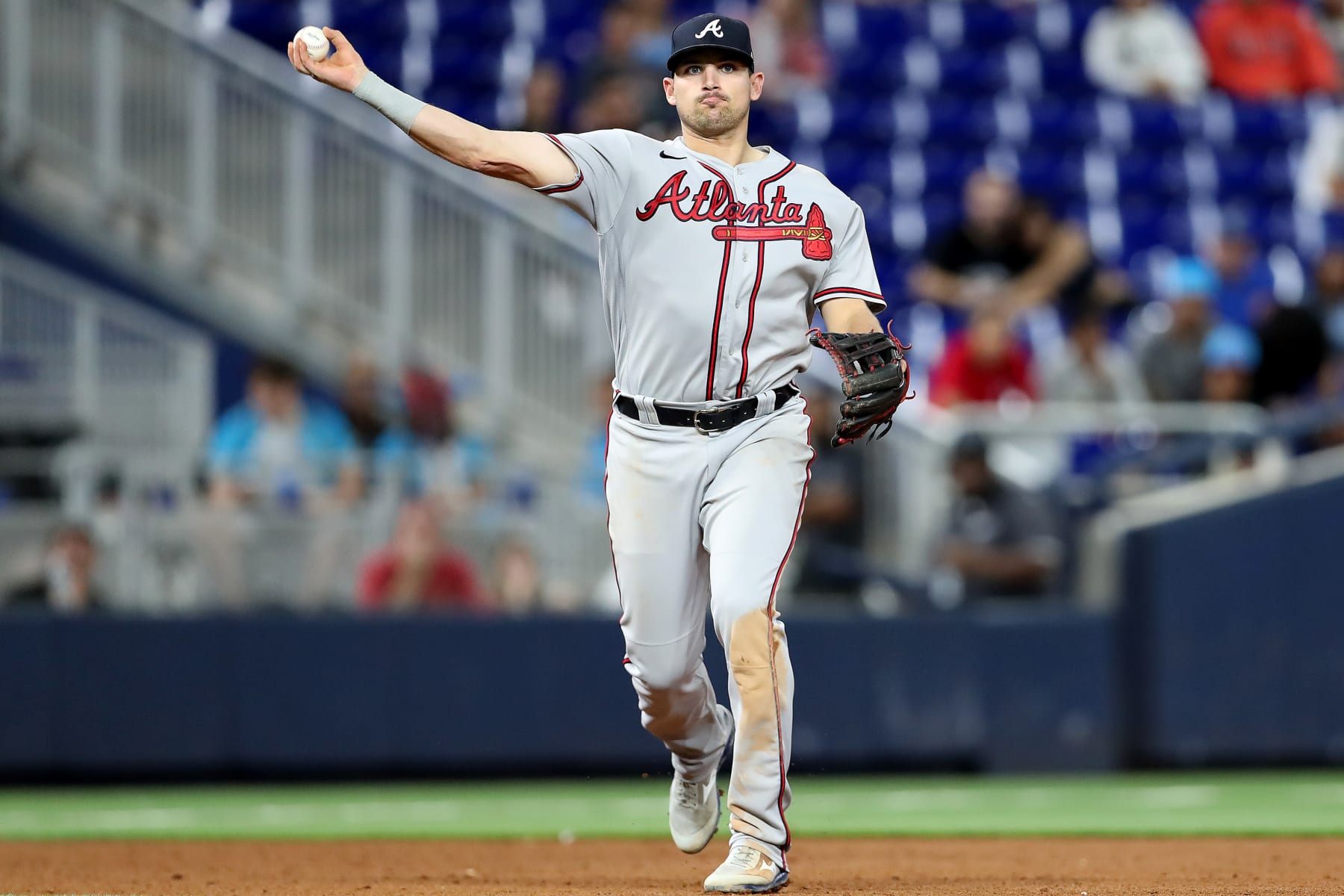 MIAMI, FLORIDA - OCTOBER 04: Austin Riley #27 of the Atlanta Braves throws to first base against the Miami Marlins during the seventh inning at loanDepot park on October 04, 2022 in Miami, Florida. (Photo by Megan Briggs/Getty Images)