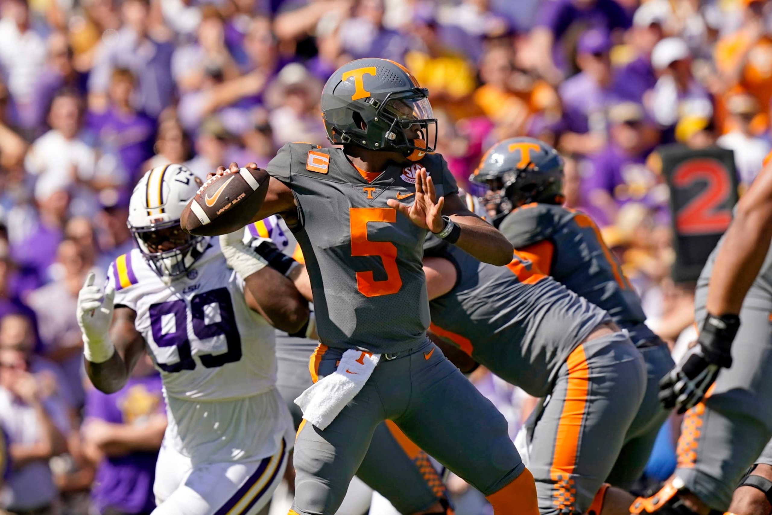 Tennessee quarterback Hendon Hooker (5) passes in the first half of an NCAA college football game against LSU in Baton Rouge, La., Saturday, Oct. 8, 2022. (AP Photo/Gerald Herbert) Tennessee quarterback Hendon Hooker (5) passes in the first half of an NCAA college football game against LSU in Baton Rouge, La., Saturday, Oct. 8, 2022. (AP Photo/Gerald Herbert)