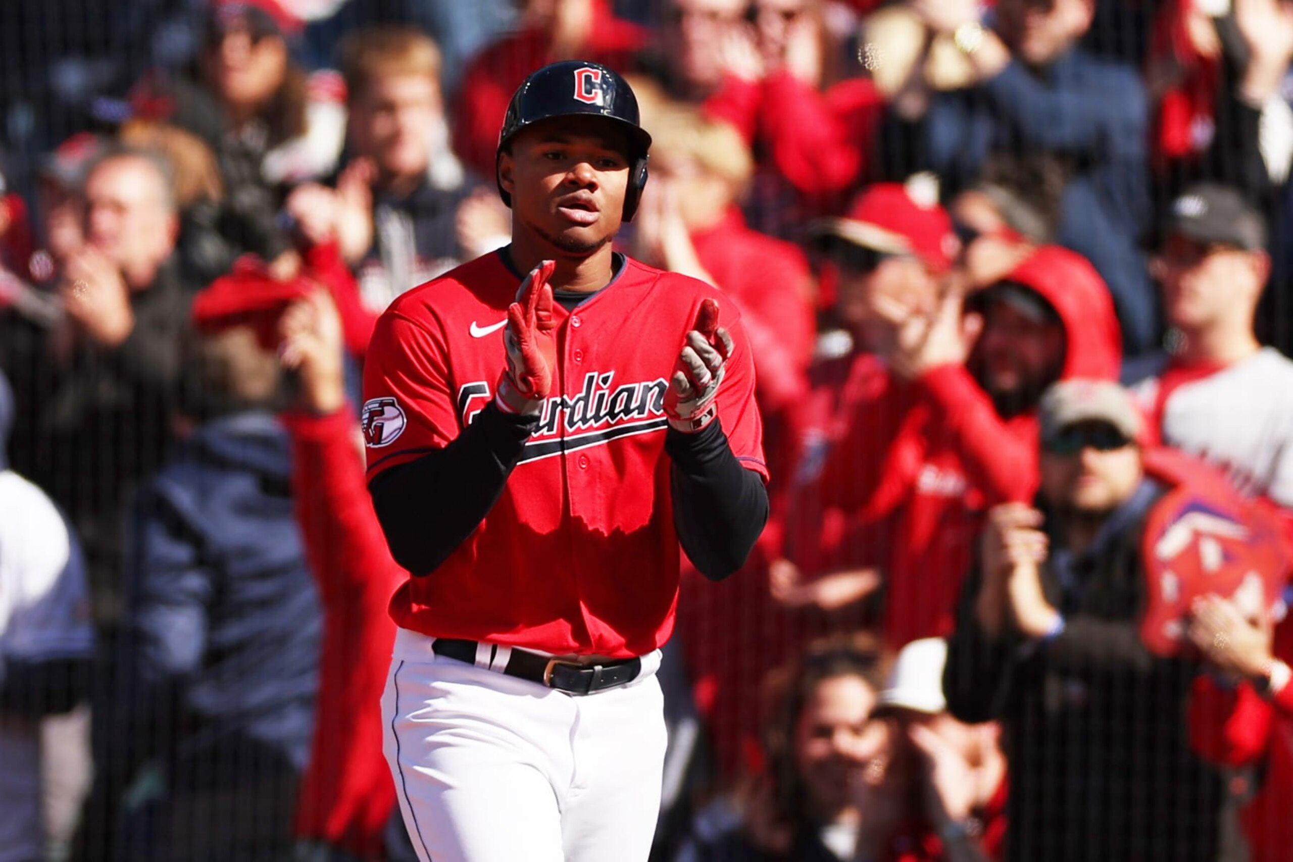 CLEVELAND, OHIO - OCTOBER 08: Oscar Gonzalez #39 of the Cleveland Guardians reacts after his infield single in the seventh inning against the Tampa Bay Rays in game two of the Wild Card Series at Progressive Field on October 08, 2022 in Cleveland, Ohio. (Photo by Patrick Smith/Getty Images)