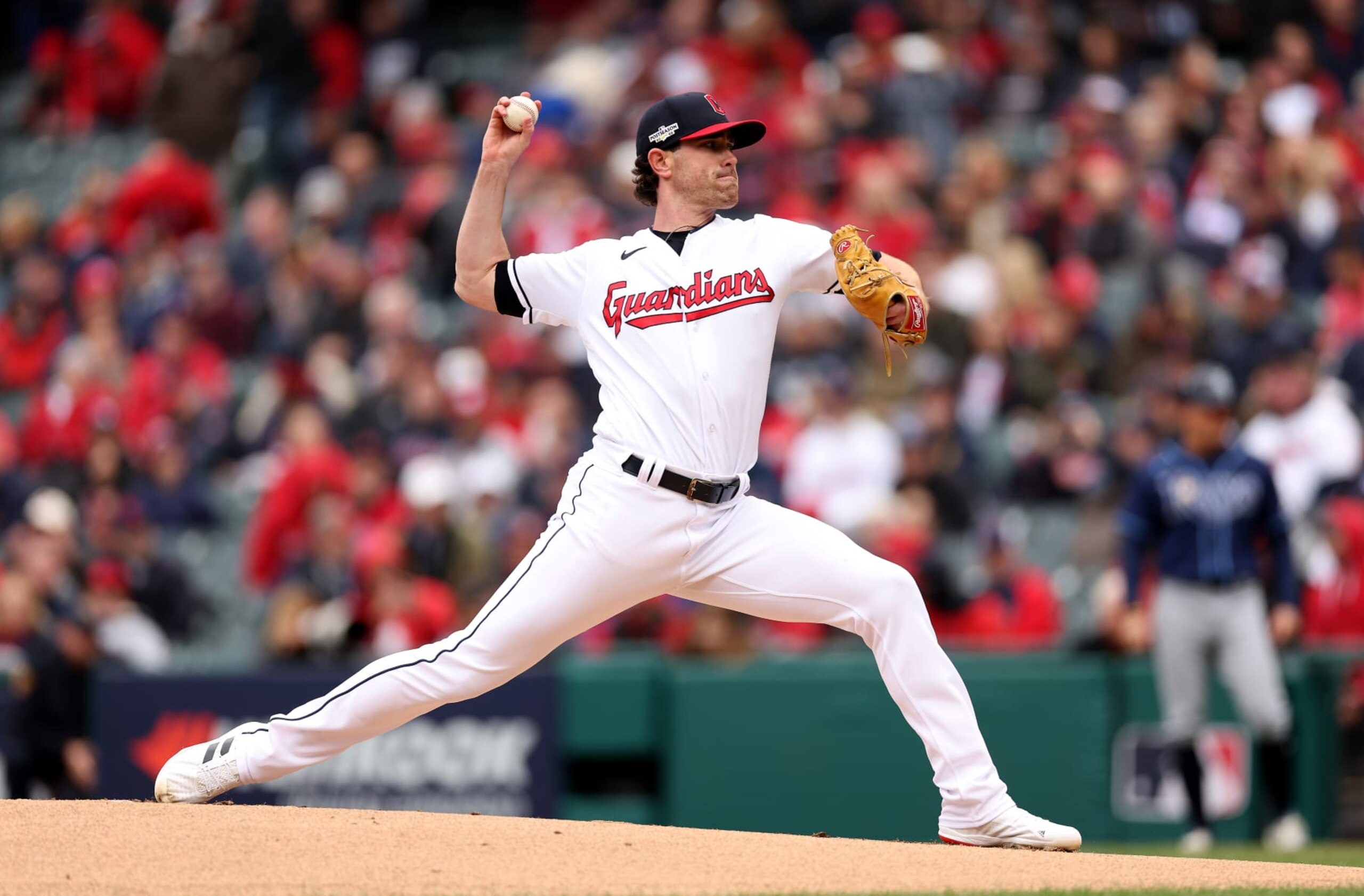 CLEVELAND, OHIO - OCTOBER 07:   Shane Bieber #57 of the Cleveland Guardians throws a pitch in the first inning against the the Tampa Bay Rays during game one of the Wild Card Series at Progressive Field on October 07, 2022 in Cleveland, Ohio. (Photo by Matthew Stockman/Getty Images)