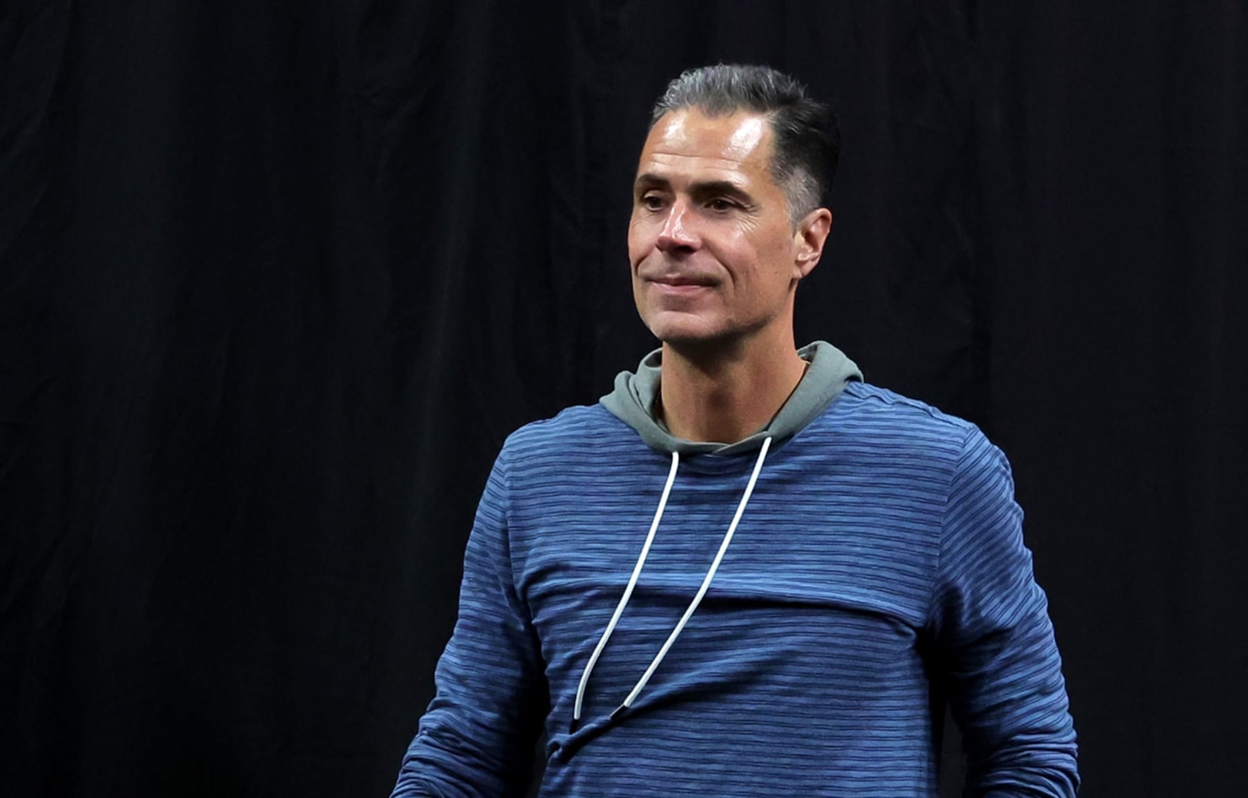 LAS VEGAS, NEVADA - OCTOBER 06: Vice president of basketball operations and general manager Rob Pelinka of the Los Angeles Lakers walks to the court before a preseason game against the Minnesota Timberwolves at T-Mobile Arena on October 06, 2022 in Las Vegas, Nevada. The Timberwolves defeated the Lakers 114-99. NOTE TO USER: User expressly acknowledges and agrees that, by downloading and or using this photograph, User is consenting to the terms and conditions of the Getty Images License Agreement. (Photo by Ethan Miller/Getty Images)