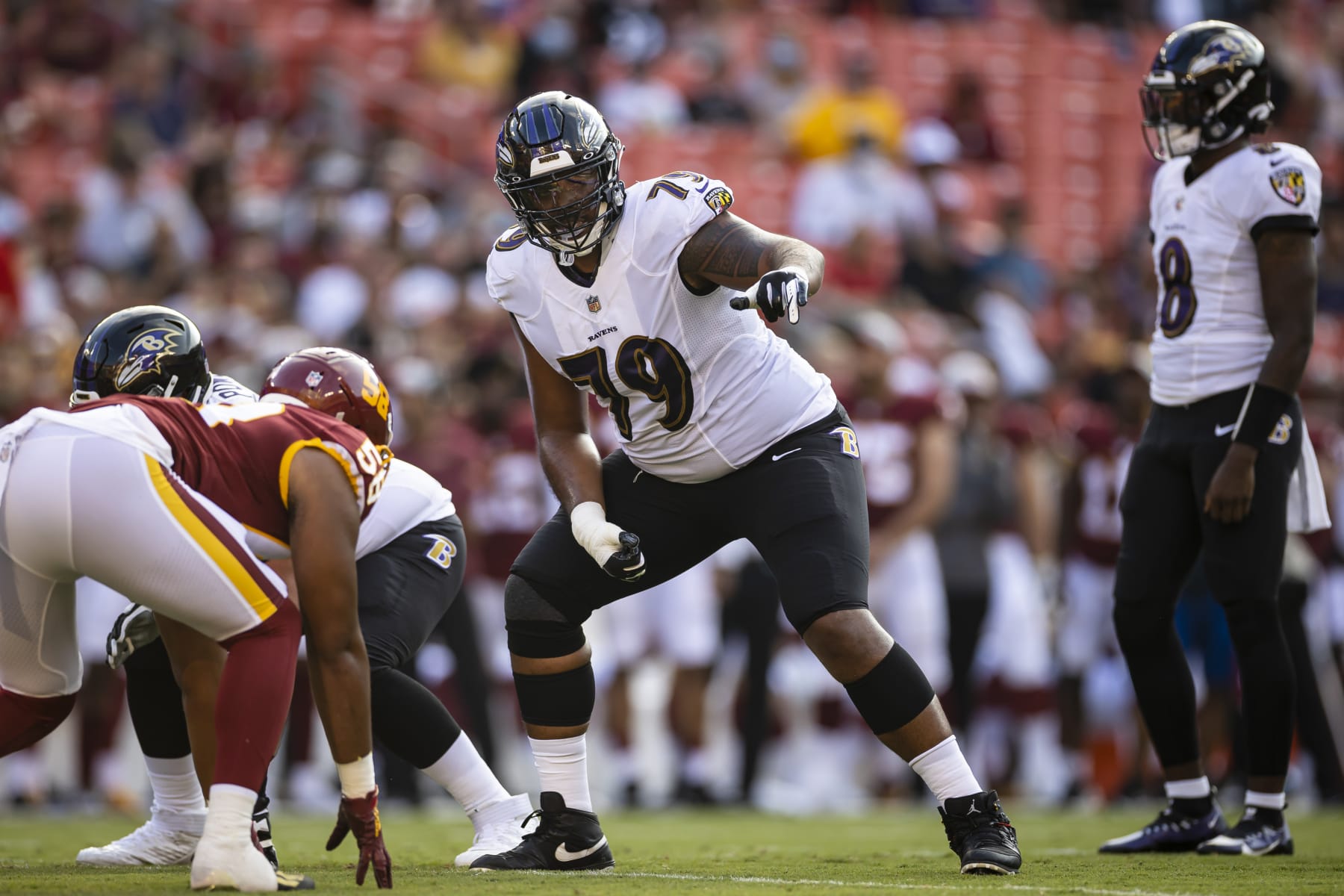 LANDOVER, MD - AUGUST 28: Ronnie Stanley #79 of the Baltimore Ravens lines up against the Washington Football Team during the first half of the preseason game at FedExField on August 28, 2021 in Landover, Maryland. (Photo by Scott Taetsch/Getty Images)