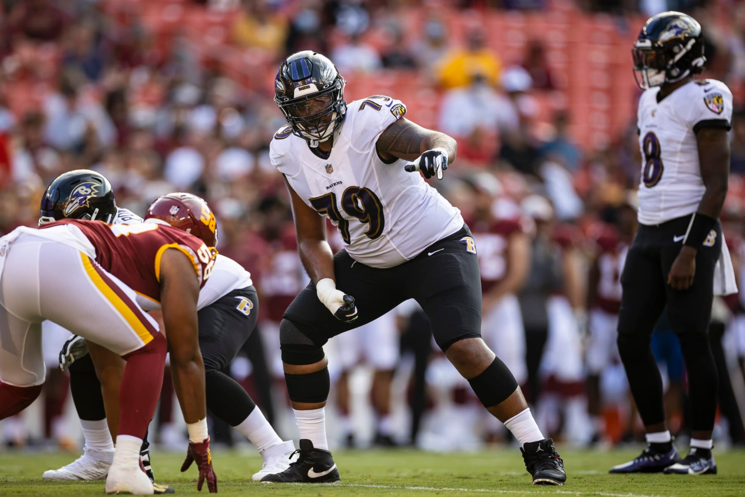 LANDOVER, MD - AUGUST 28: Ronnie Stanley #79 of the Baltimore Ravens lines up against the Washington Football Team during the first half of the preseason game at FedExField on August 28, 2021 in Landover, Maryland. (Photo by Scott Taetsch/Getty Images)