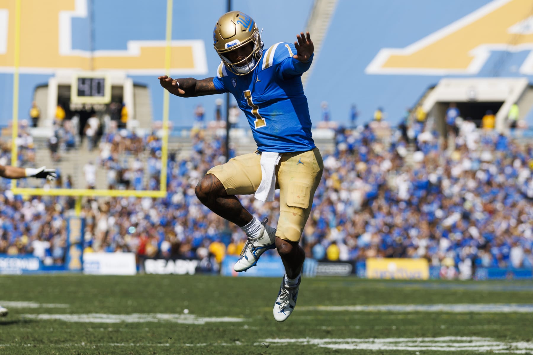 PASADENA, CA - OCTOBER 29: UCLA Bruins quarterback Dorian Thompson-Robinson (1) celebrates a touchdown during the college football game between the Utah Utes and the UCLA Bruins on Saturday, October 8, 2022 at the Rose Bowl in Pasadena, CA. (Photo by Ric Tapia/Icon Sportswire via Getty Images)