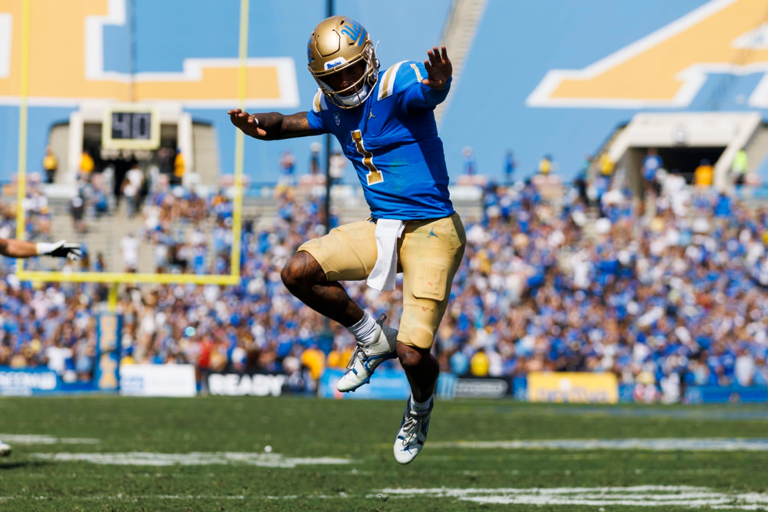 PASADENA, CA - OCTOBER 29: UCLA Bruins quarterback Dorian Thompson-Robinson (1) celebrates a touchdown during the college football game between the Utah Utes and the UCLA Bruins on Saturday, October 8, 2022 at the Rose Bowl in Pasadena, CA. (Photo by Ric Tapia/Icon Sportswire via Getty Images) PASADENA, CA - OCTOBER 29: UCLA Bruins quarterback Dorian Thompson-Robinson (1) celebrates a touchdown during the college football game between the Utah Utes and the UCLA Bruins on Saturday, October 8, 2022 at the Rose Bowl in Pasadena, CA. (Photo by Ric Tapia/Icon Sportswire via Getty Images)