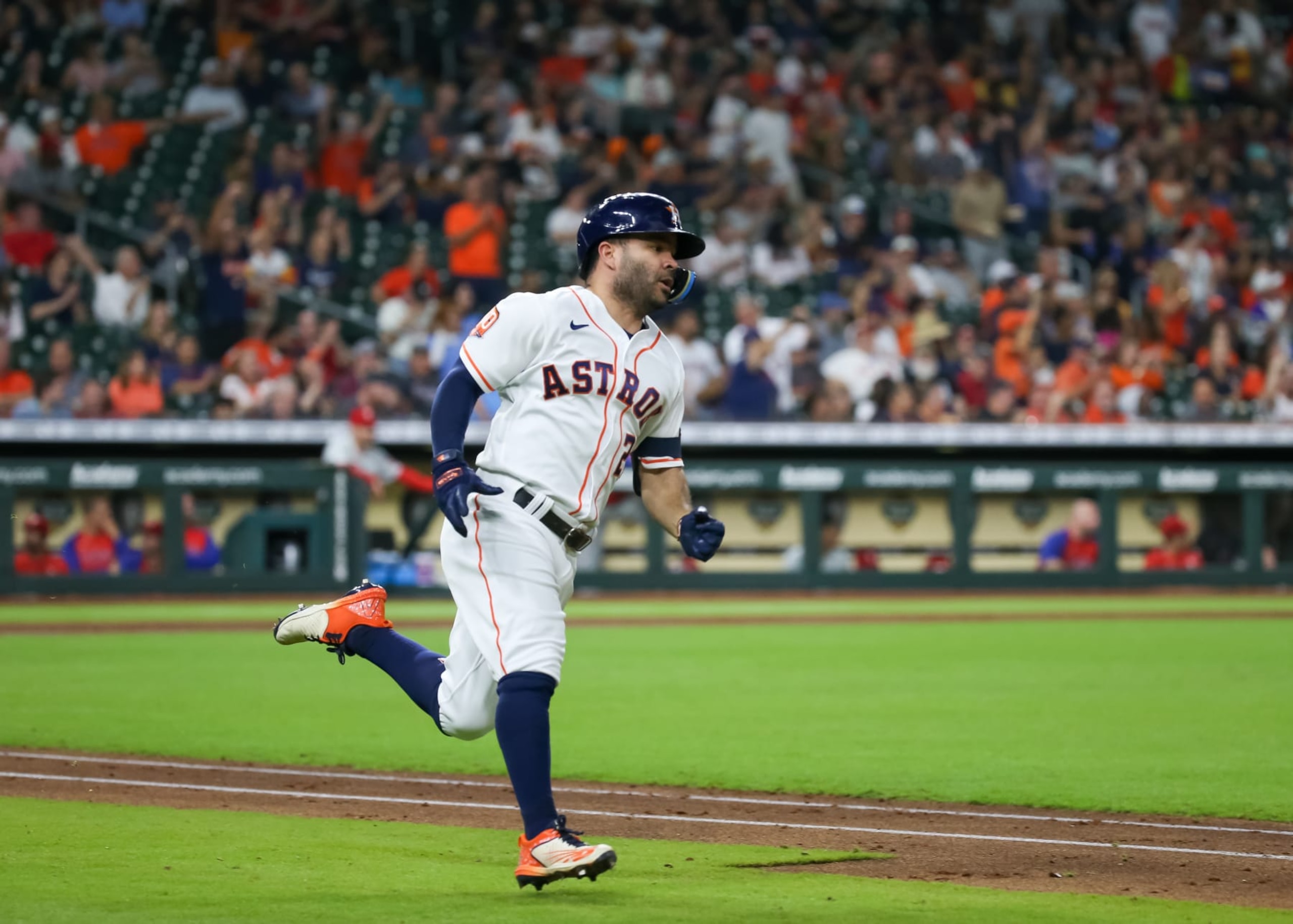 HOUSTON, TX - OCTOBER 04:  Houston Astros second baseman Jose Altuve (27) hits a double in the bottom of the fifth inning during the MLB game between the Philadelphia Phillies and Houston Astros on October 4, 2022 at Minute Maid Park in Houston, Texas.  (Photo by Leslie Plaza Johnson/Icon Sportswire via Getty Images)