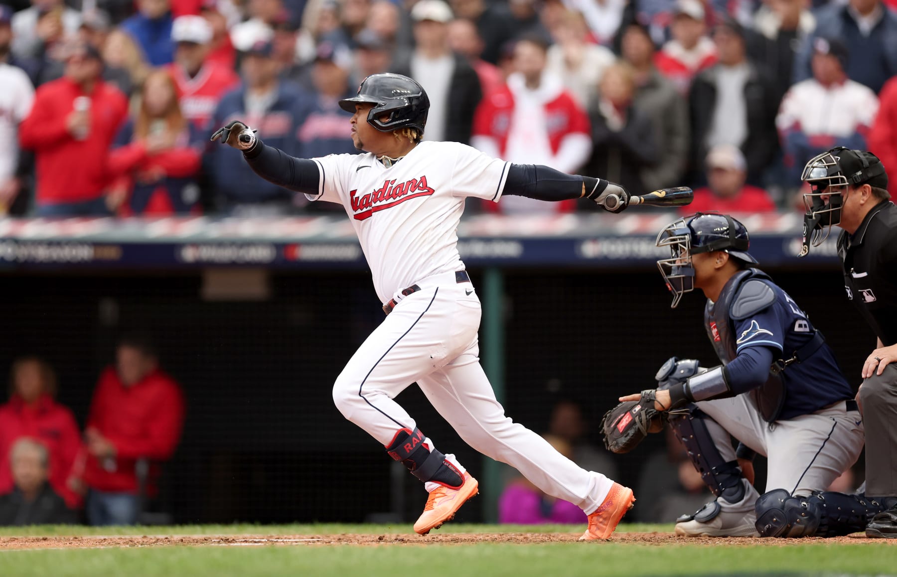 CLEVELAND, OHIO - OCTOBER 07: Jose Ramirez #11 of the Cleveland Guardians hits a single in the 8th inning against the Tampa Bay Rays in game one of the Wild Card Series at Progressive Field on October 07, 2022 in Cleveland, Ohio. (Photo by Matthew Stockman/Getty Images)