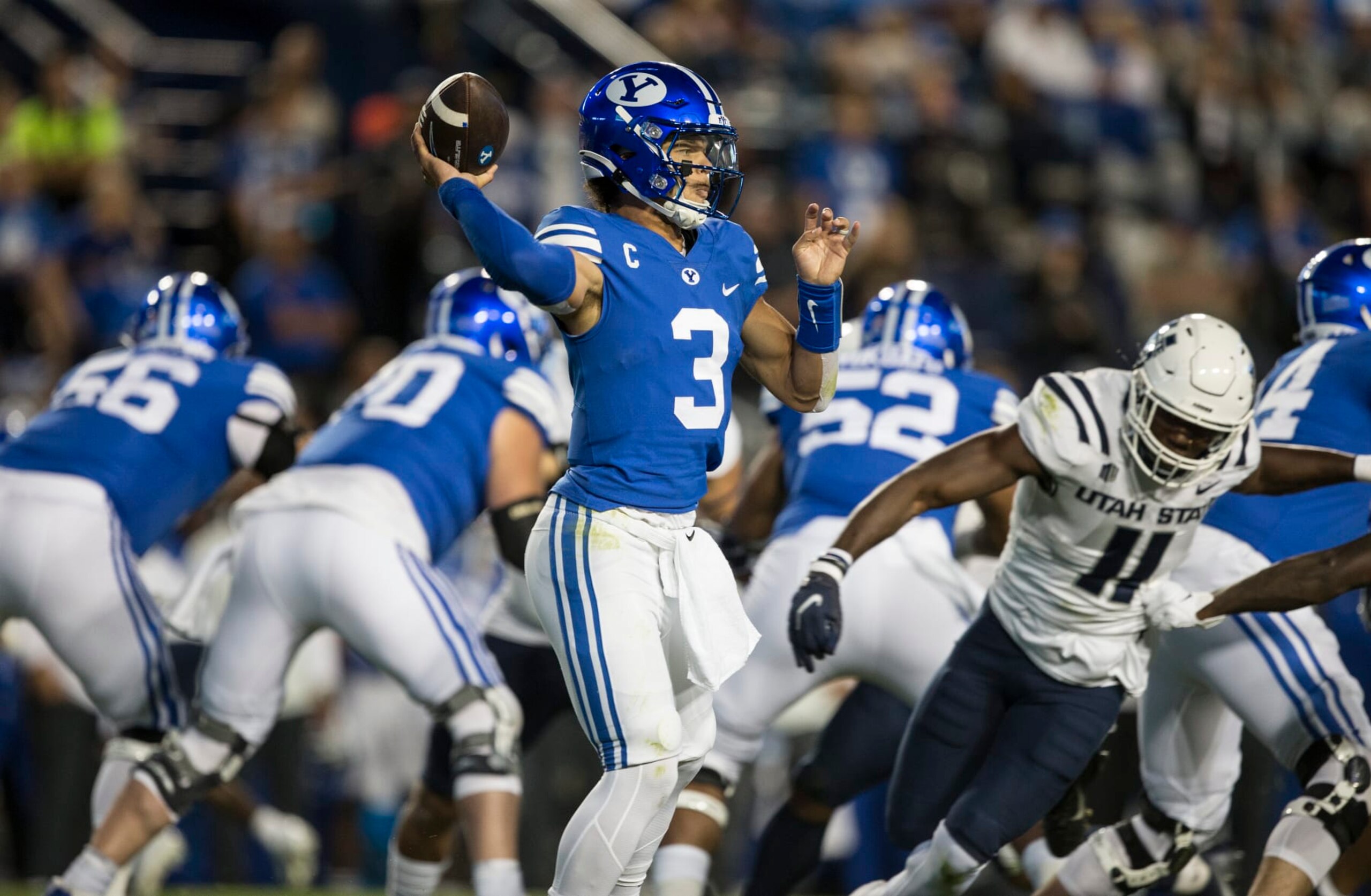 PROVO, UT- SEPTEMBER 29: Jaren Hall #3 of the Brigham Young Cougars throws a pass against the Utah State Aggies during the first half of their game September 29, 2022 at LaVell Edwards Stadium in Provo, Utah. (Photo by Chris Gardner/Getty Images) PROVO, UT- SEPTEMBER 29: Jaren Hall #3 of the Brigham Young Cougars throws a pass against the Utah State Aggies during the first half of their game September 29, 2022 at LaVell Edwards Stadium in Provo, Utah. (Photo by Chris Gardner/Getty Images)