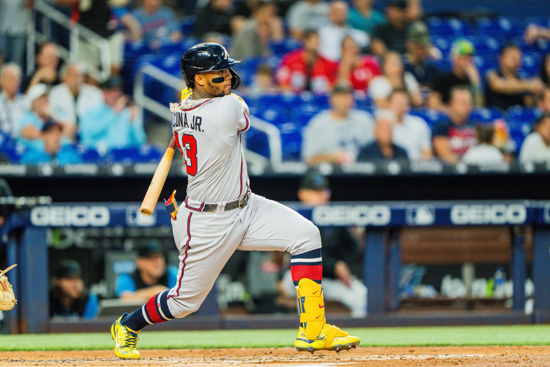 MIAMI, FL - OCTOBER 04: Ronald Acuña Jr. #13 of the Atlanta Braves hits a an RBI single during the second inning against the Miami Marlins at loanDepot park on October 4, 2022 in Miami, Florida. (Photo by Kevin D. Liles/Atlanta Braves/Getty Images)